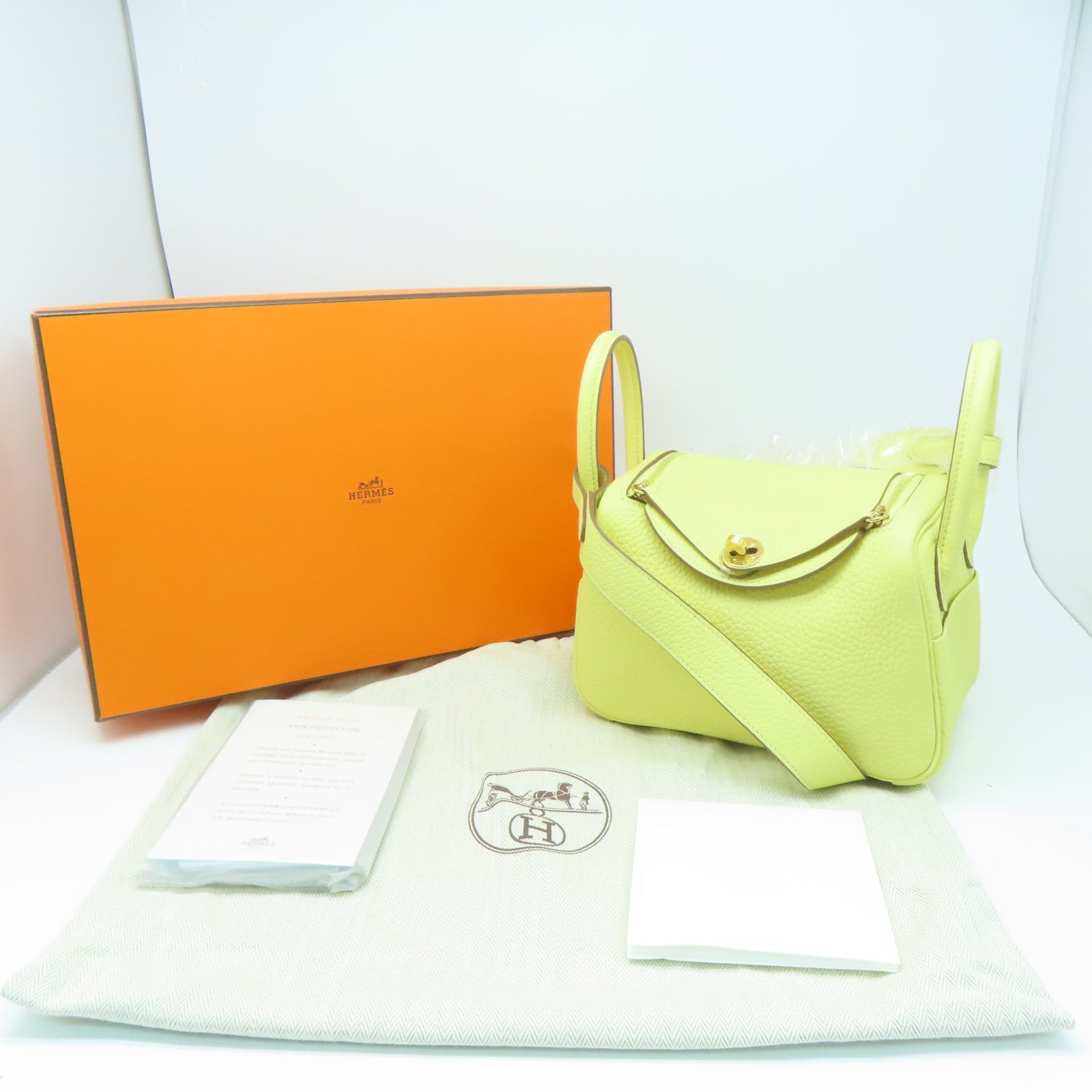 HERMES Clemence皮革Mini Lindy GHW金扣肩背袋小鸡黄嫩黄