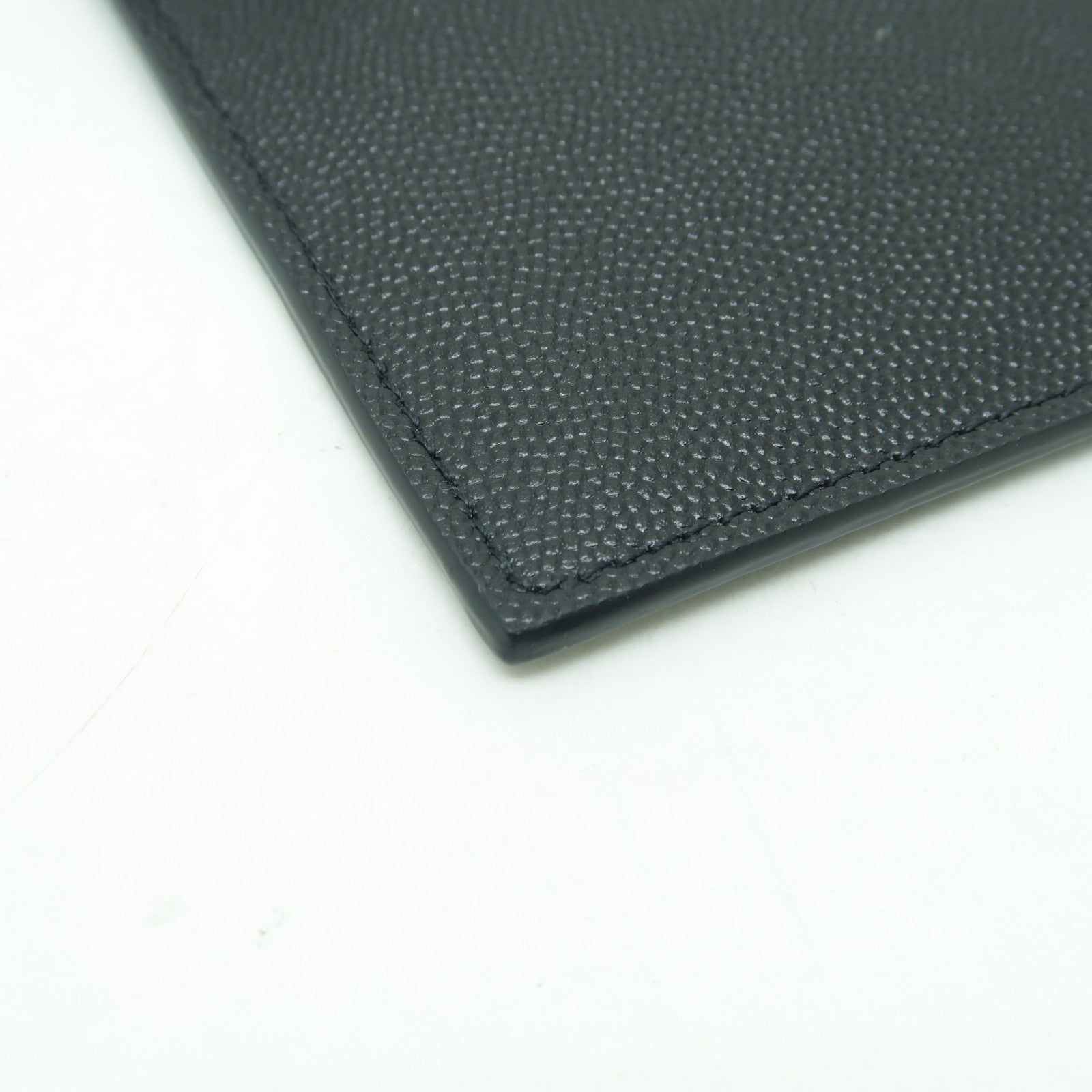 SAINT LAURENT 牛皮皮革Pouch金扣手拿包黑色