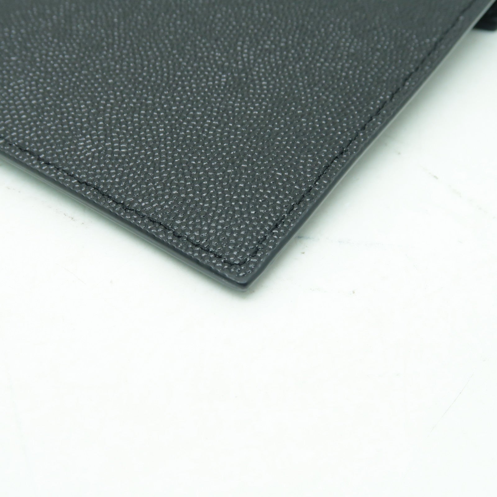 SAINT LAURENT 牛皮皮革Pouch金扣手拿包黑色