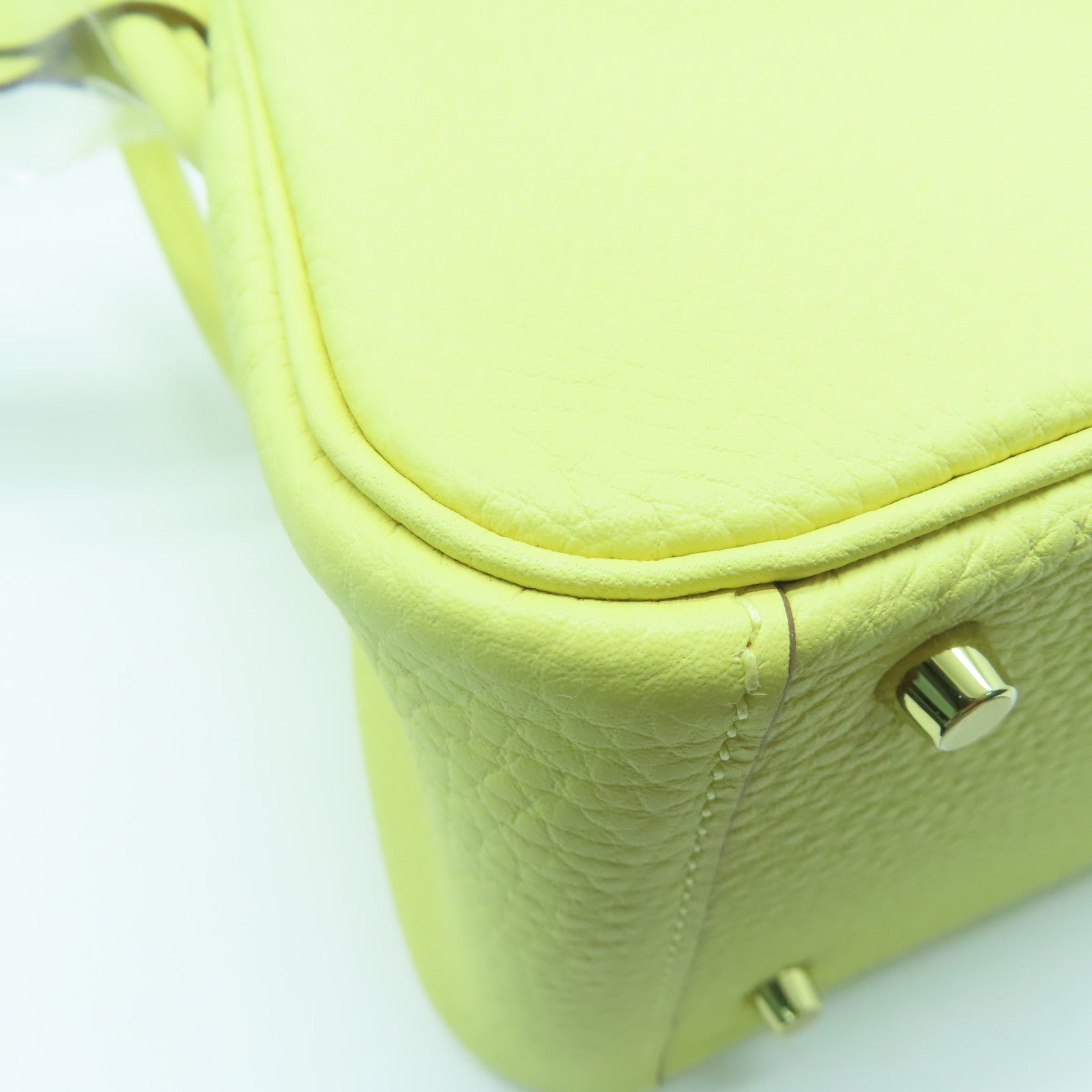 HERMES Clemence皮革Mini Lindy GHW金扣肩背袋小鸡黄嫩黄