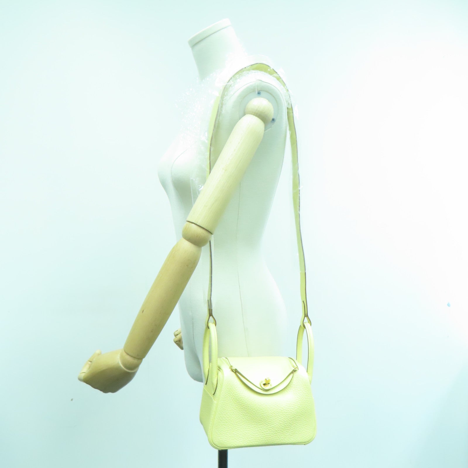 HERMES Clemence皮革Mini Lindy GHW金扣肩背袋小鸡黄嫩黄