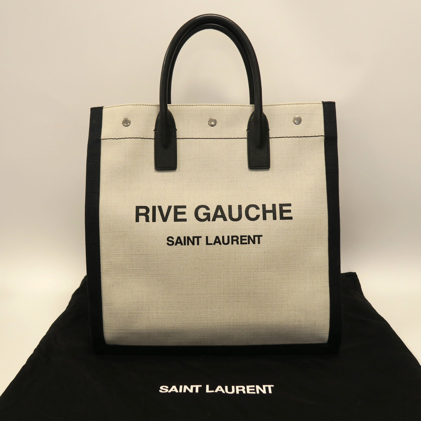 SAINT LAURENT 帆布Rive Gauche Handbag銀扣手挽袋米色/黑色