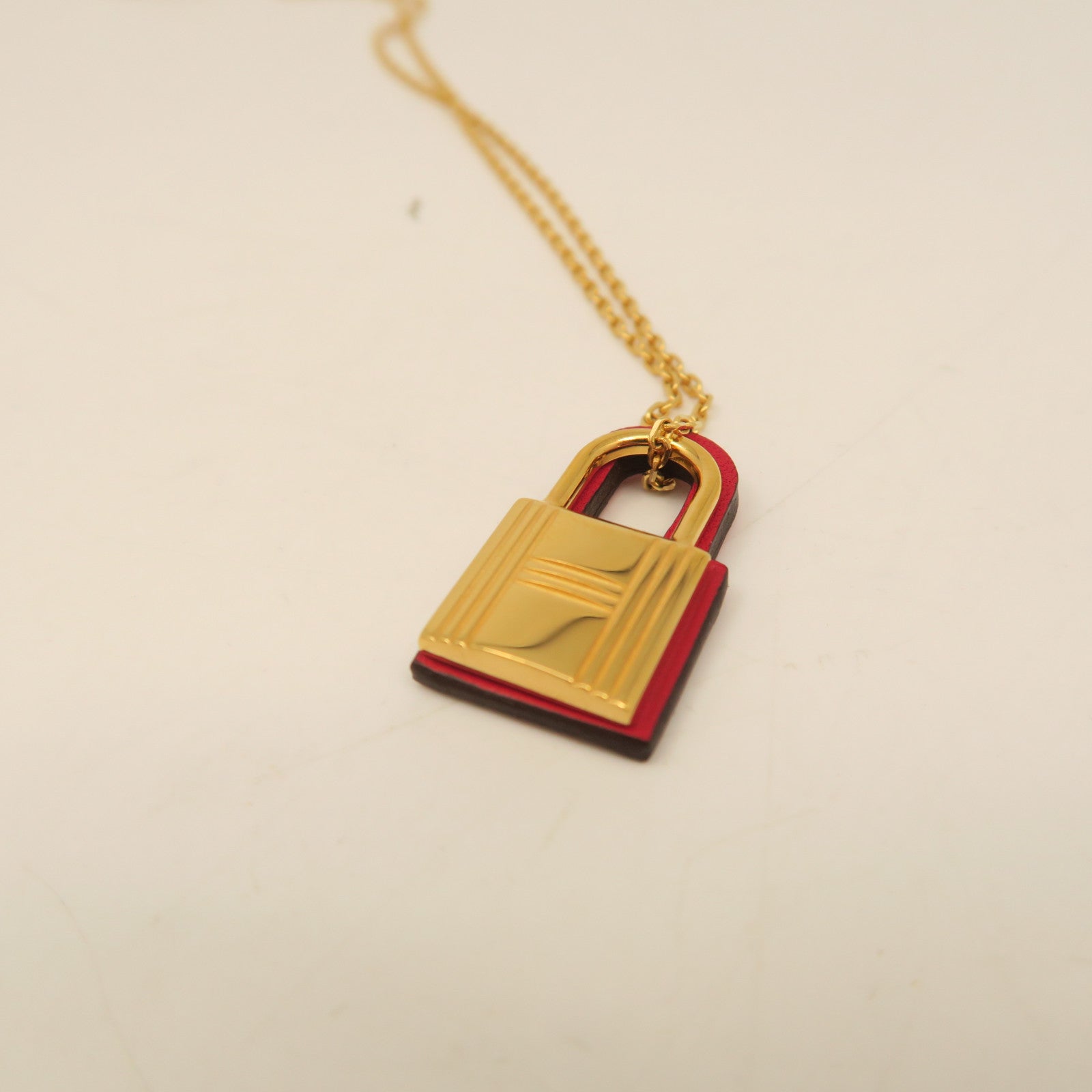 HERMES Metal Necklace Red/Gold