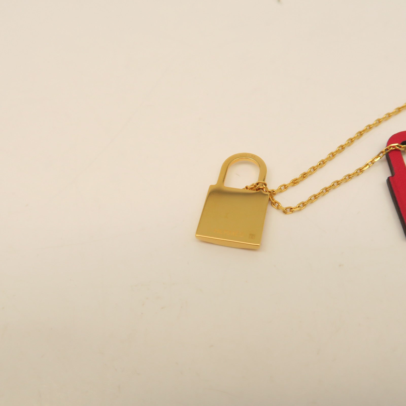 HERMES Metal Necklace Red/Gold
