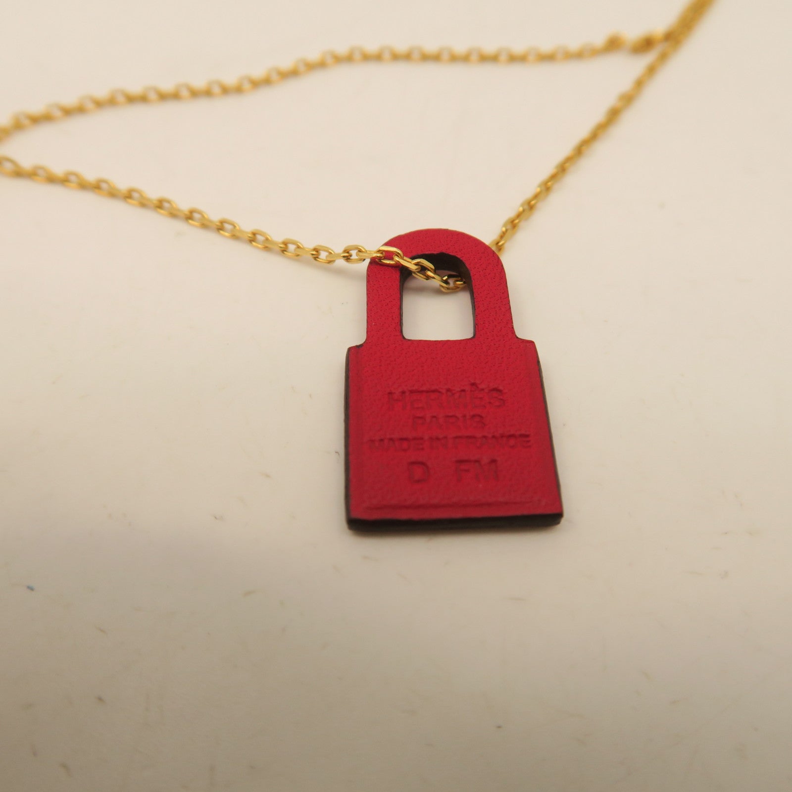 HERMES Metal Necklace Red/Gold