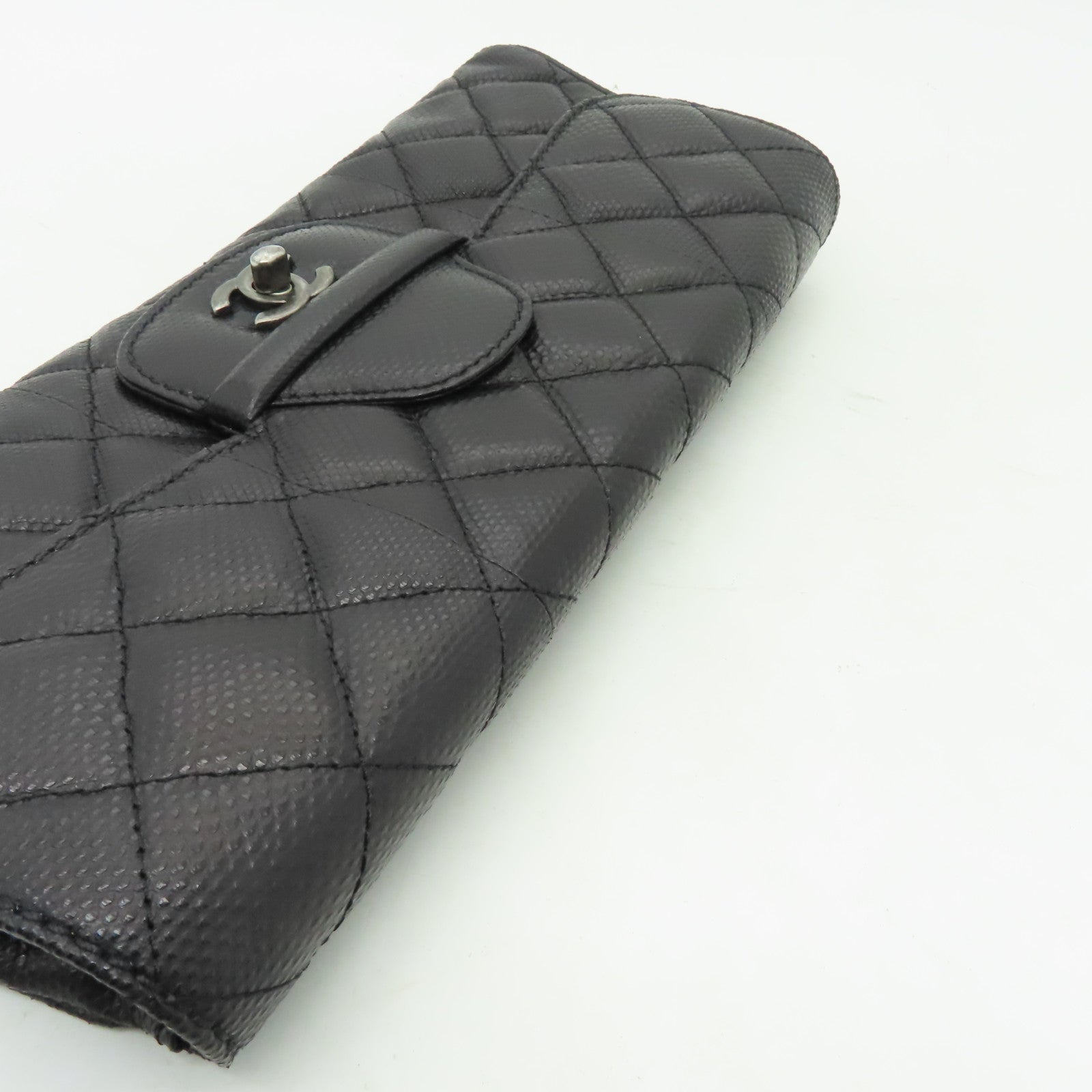 CHANEL 菱格蛇皮皮革Clutch銀扣手拿包黑色