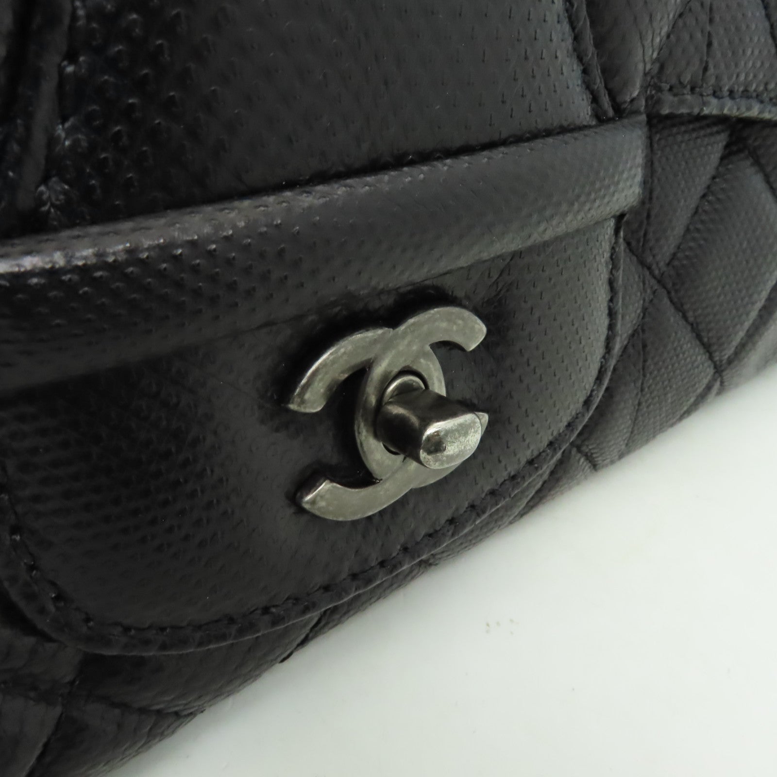 CHANEL 菱格蛇皮皮革Clutch銀扣手拿包黑色