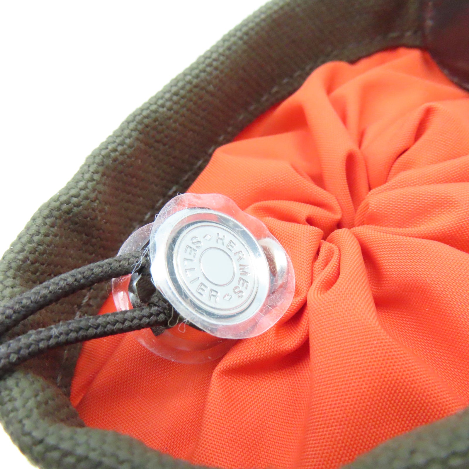 HERMES 帆布On The Go Dog Pouch銀扣手拿包軍綠色/橙色