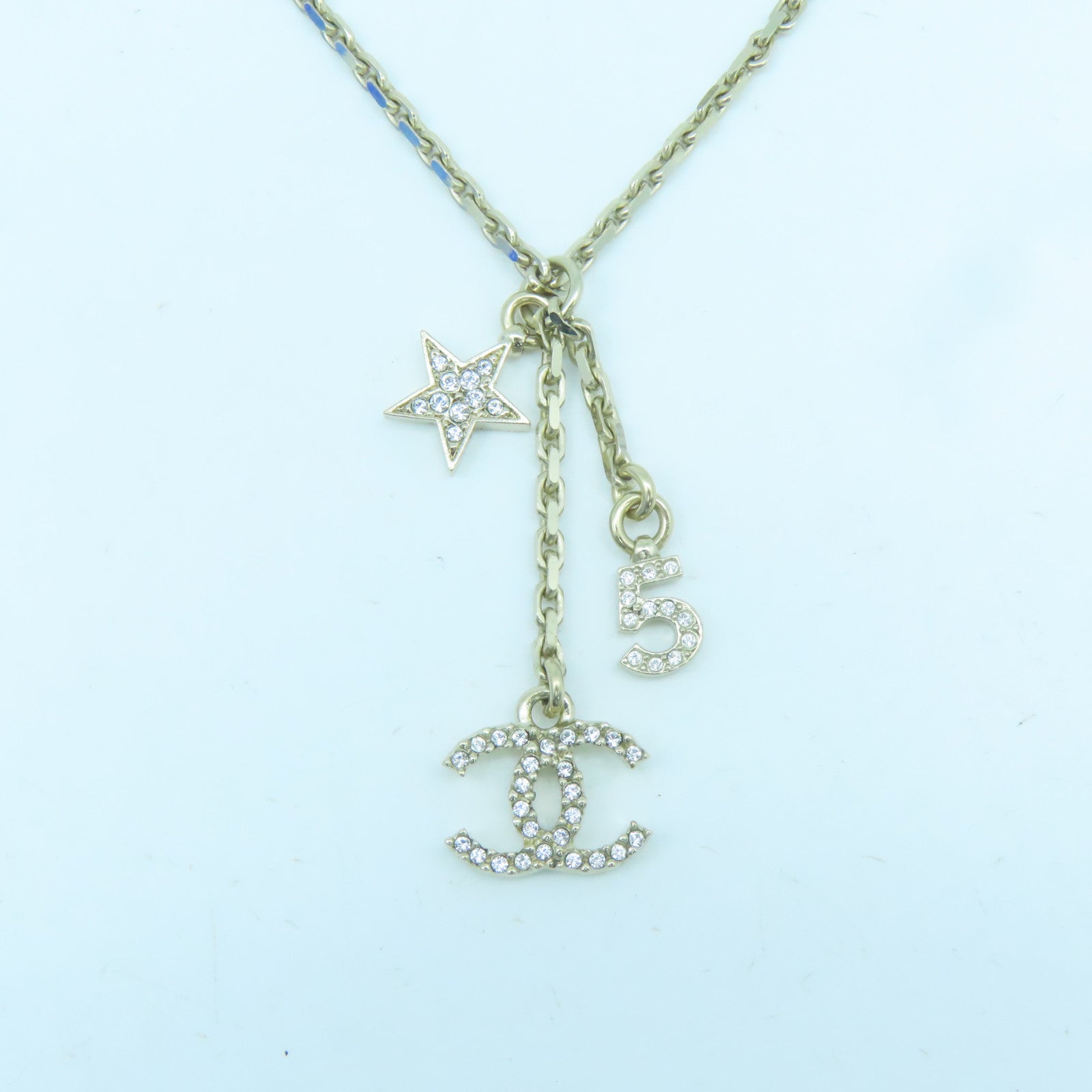 CHANEL Metal Logo No.5 Star Necklace Gold