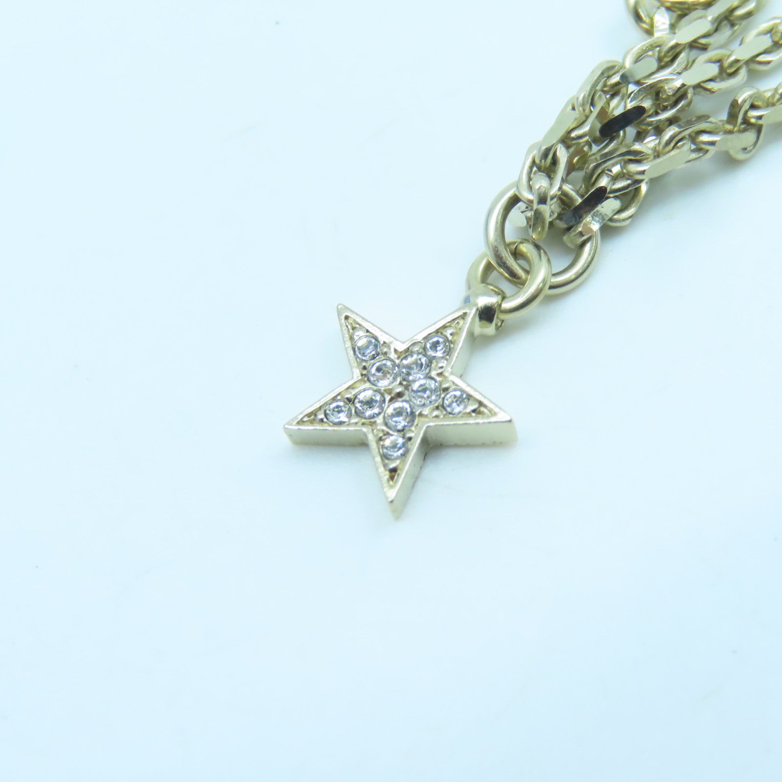 CHANEL Metal Logo No.5 Star Necklace Gold