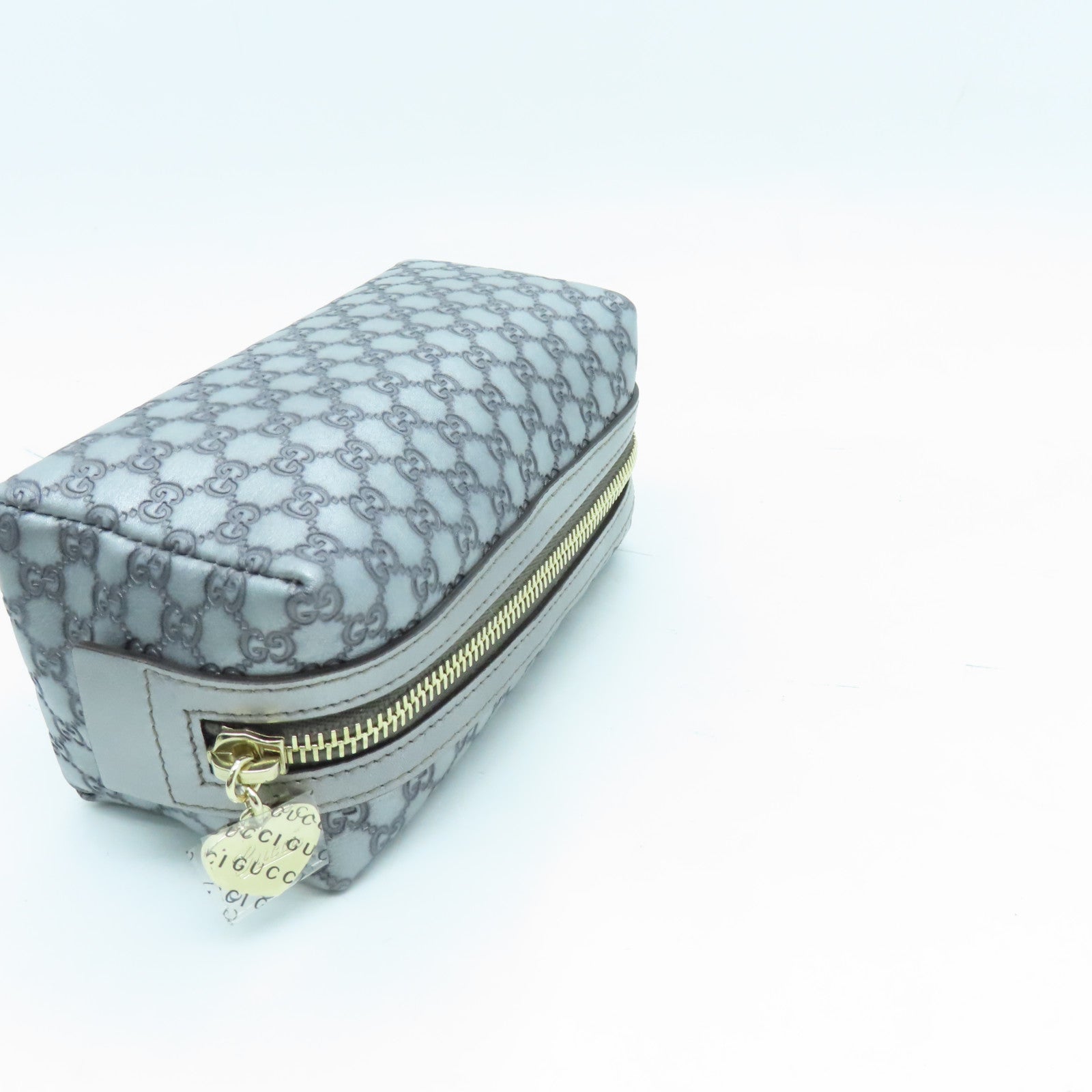 GUCCI 牛皮皮革Pouch金扣手拿包銀色
