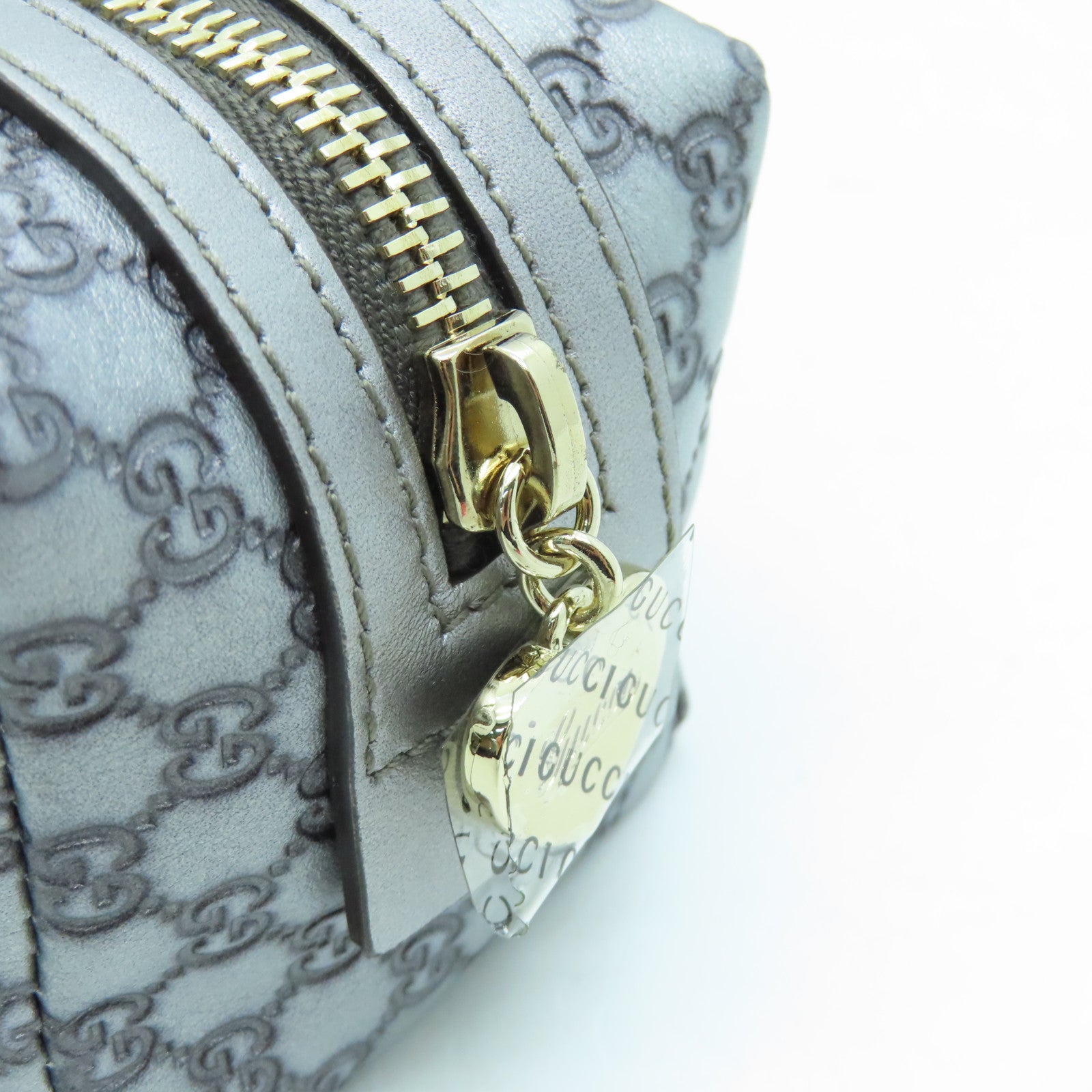 GUCCI 牛皮皮革Pouch金扣手拿包銀色