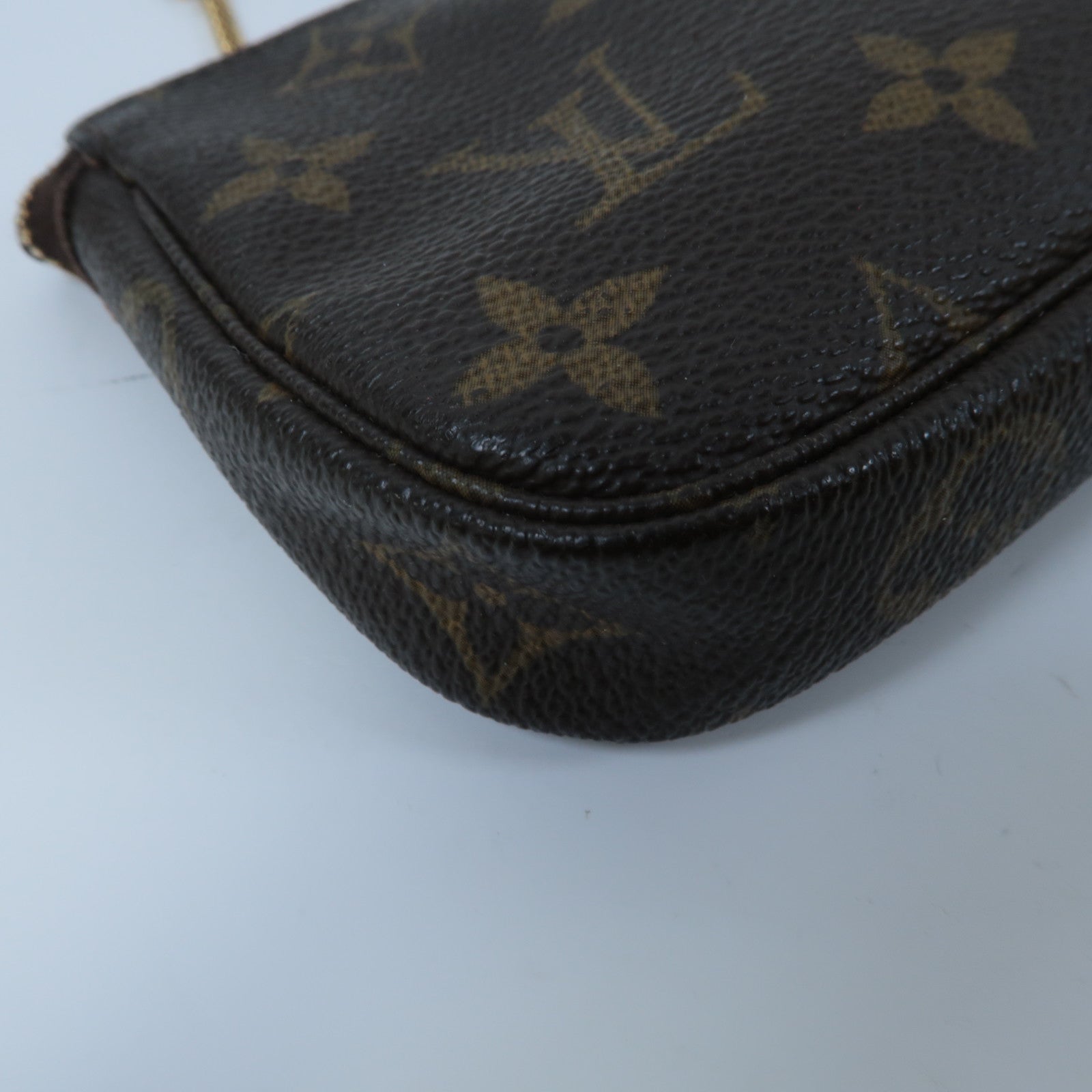 LOUIS VUITTON Monogram Mini Pochette Accessoires金扣手挽袋啡色