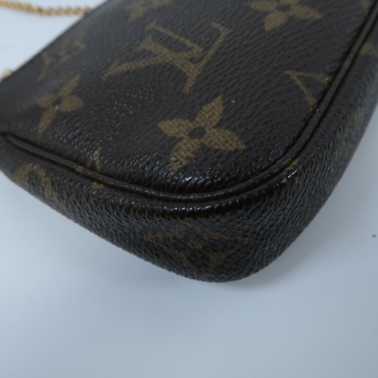 LOUIS VUITTON Monogram Mini Pochette Accessoires金扣手挽袋啡色