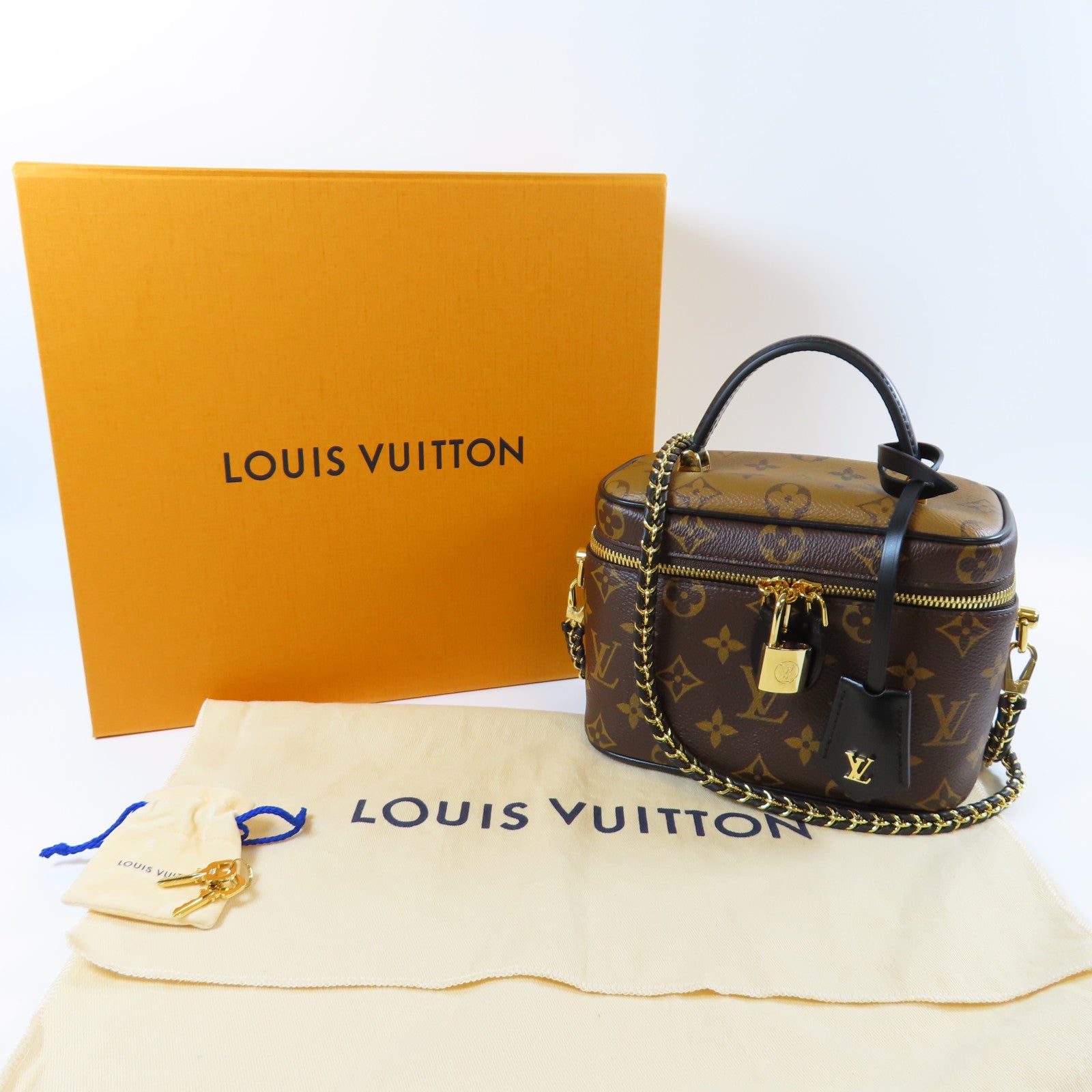 LOUIS VUITTON Monogram Reverse Vanity PM金扣手挽肩背兩用袋啡色