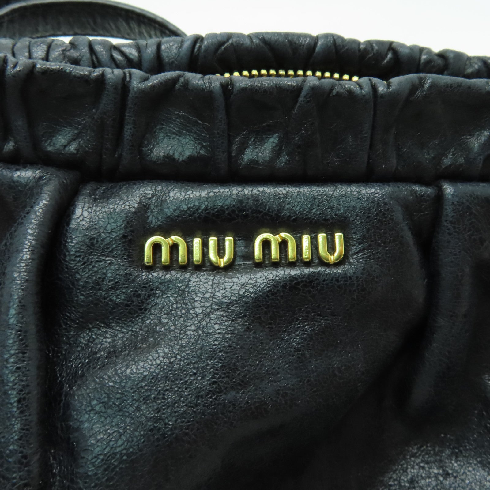 Miu Miu 牛皮皮革Shoulder Bag金扣肩背袋黑色