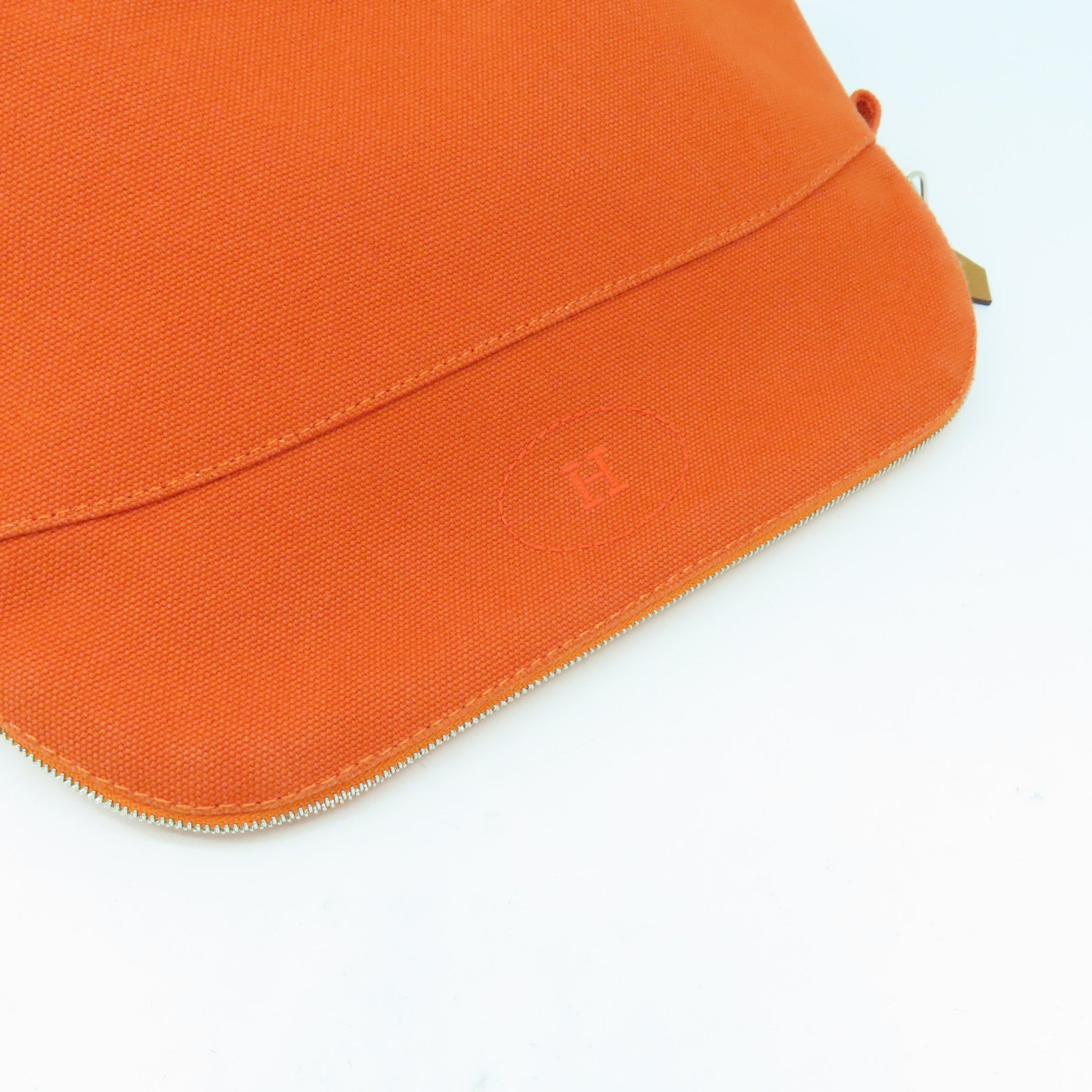 HERMES Toile H帆布Trousse Bolide MM銀扣手拿包橙色