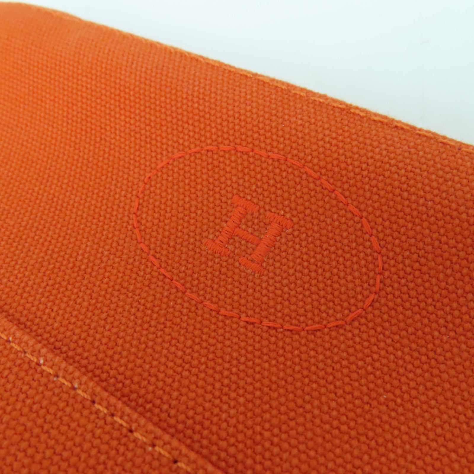 HERMES Toile H帆布Trousse Bolide MM銀扣手拿包橙色