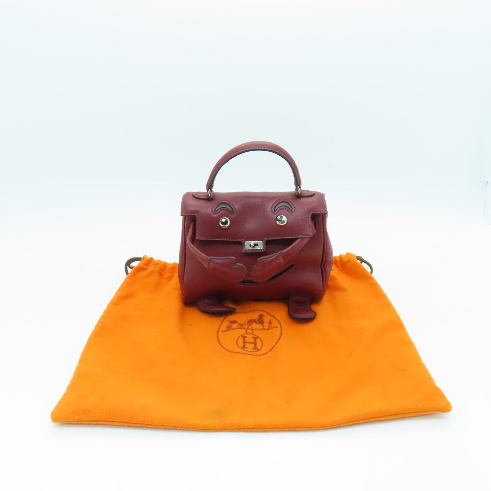 HERMES Swift leather Kelly Doll silver buckle handle bag wine red