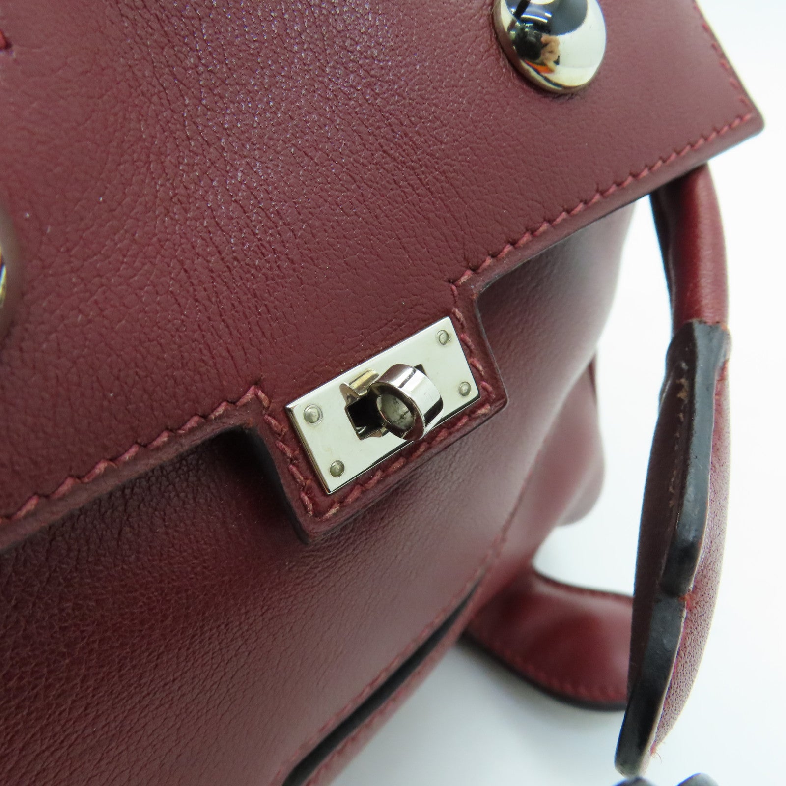 HERMES Swift leather Kelly Doll silver buckle handle bag wine red