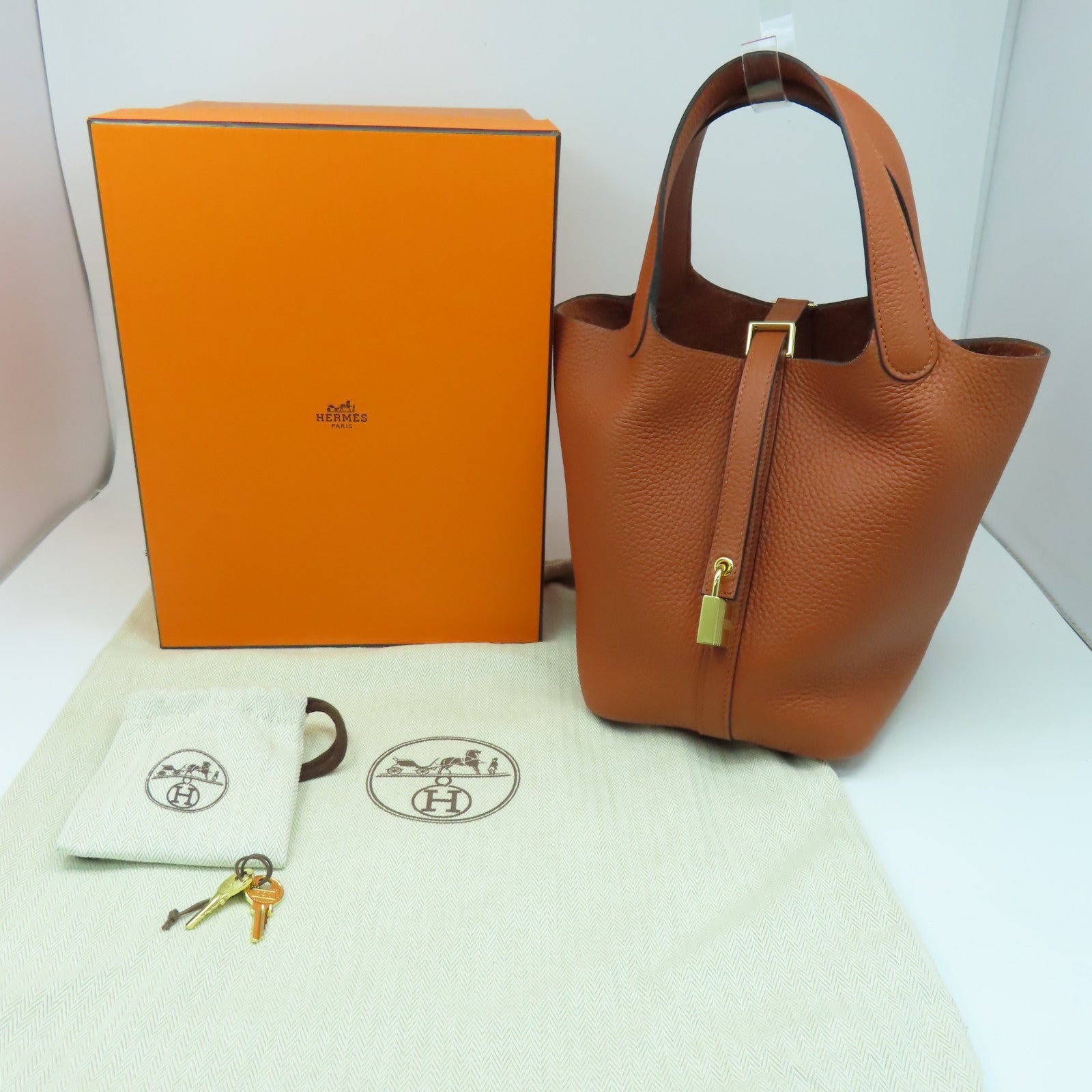 HERMES Clemence皮革Picotin PM金扣手挽袋Cuivre南瓜色