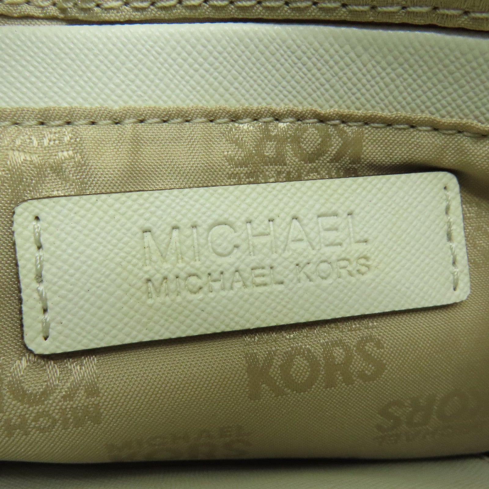 Michael Kors 塗層帆布LG Wristlet金扣手挽袋白色