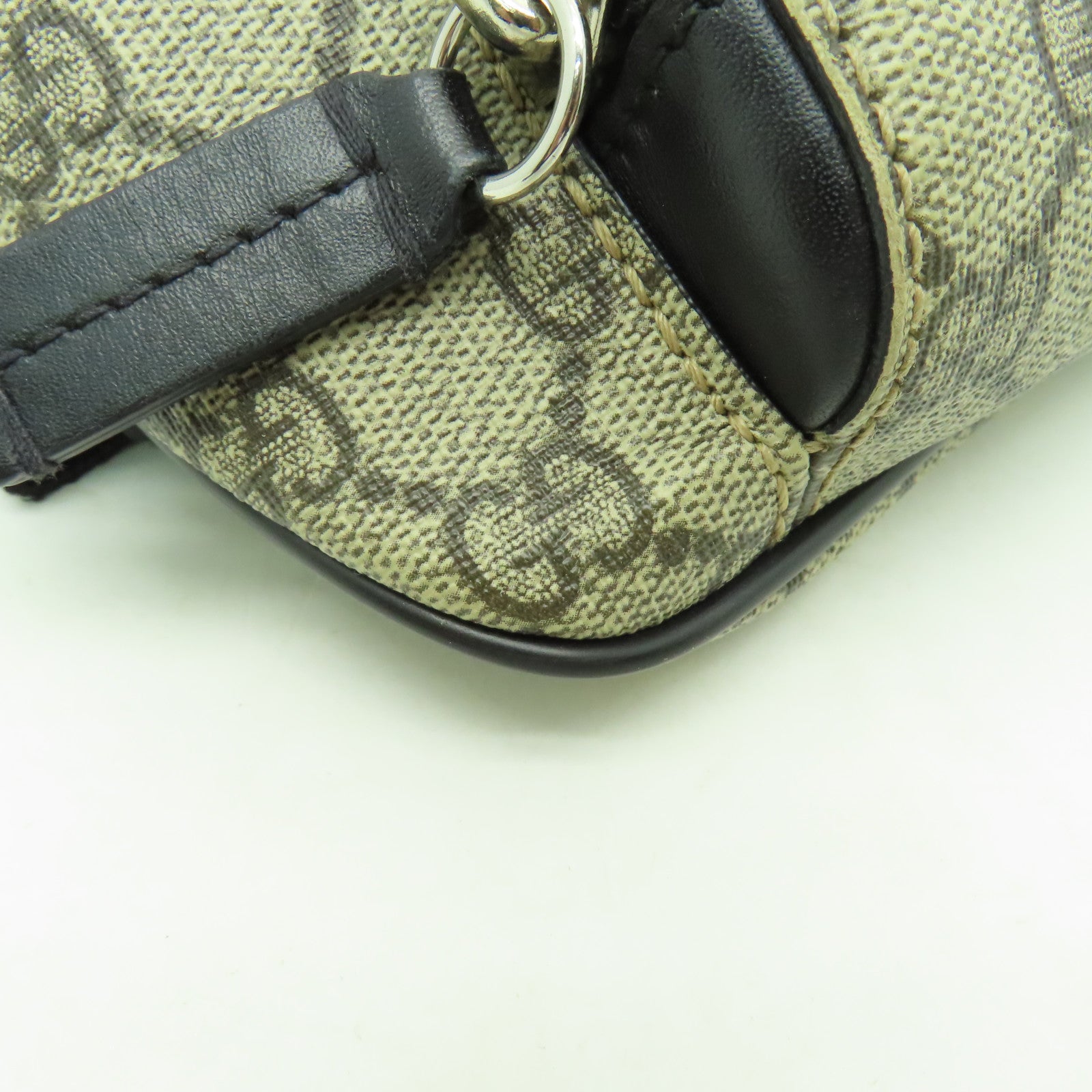 GUCCI 塗層帆布Eden Belt Bag銀扣腰包黒色/棕色