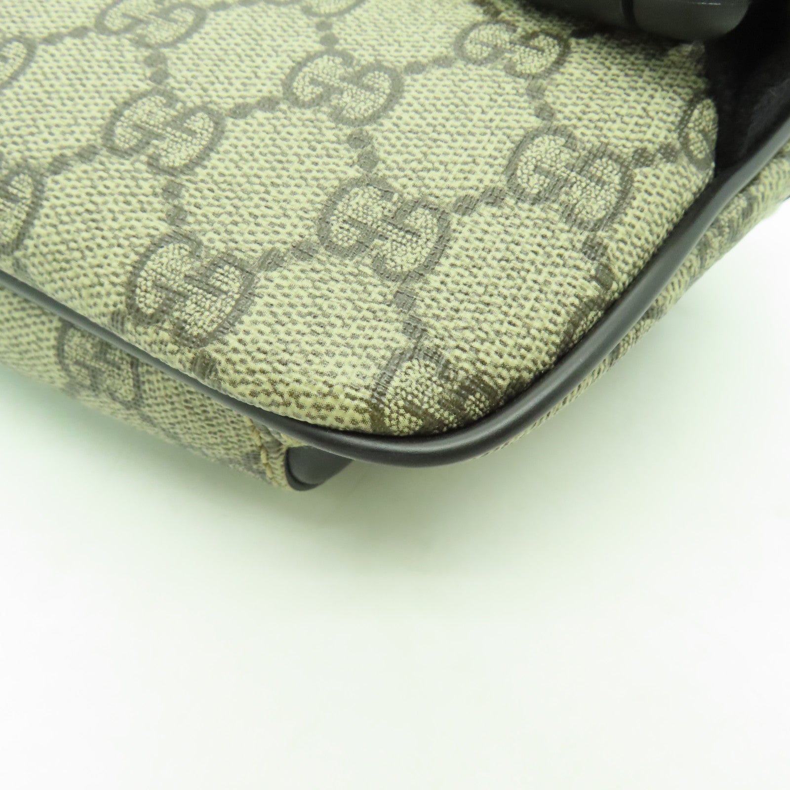 GUCCI 塗層帆布Eden Belt Bag銀扣腰包黒色/棕色