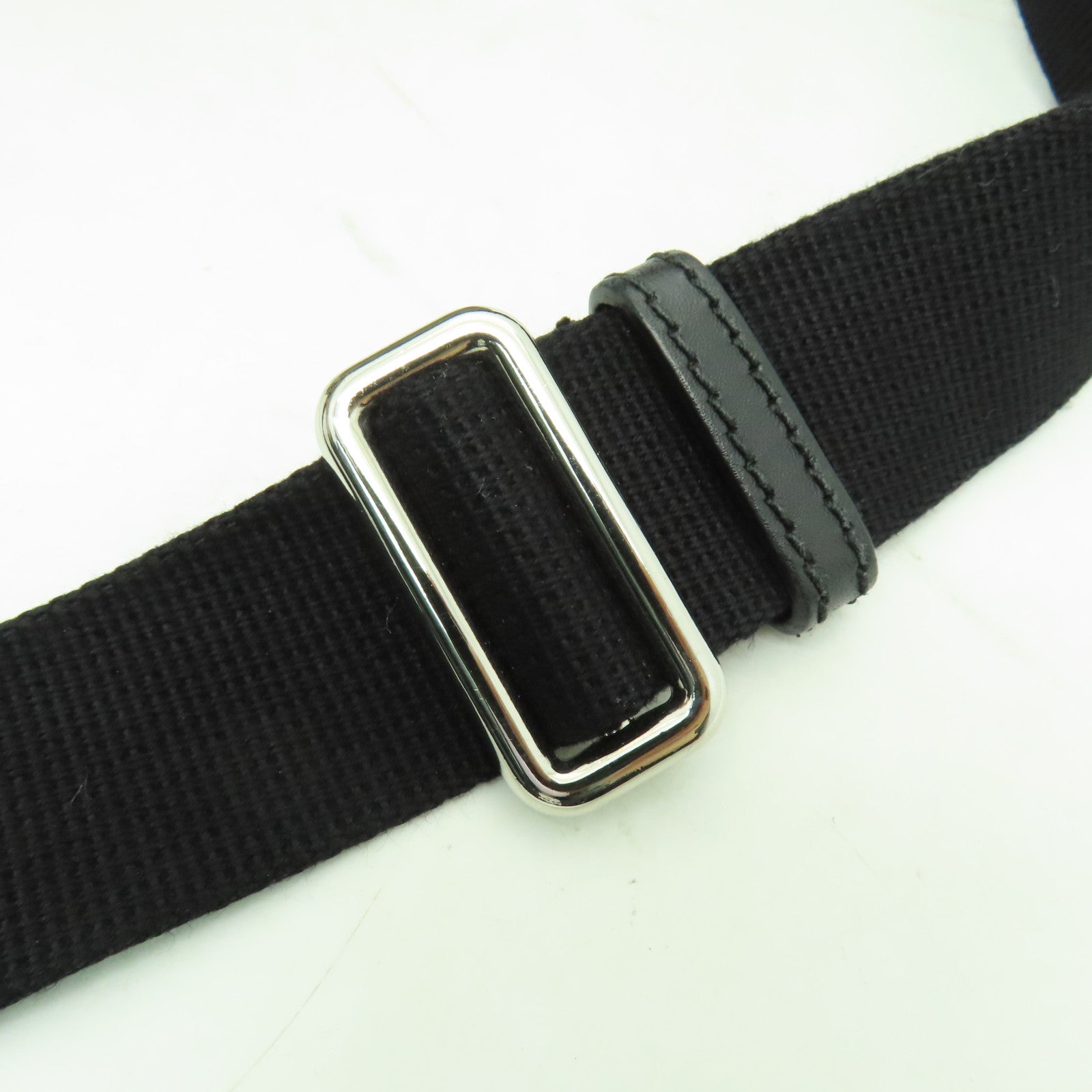 GUCCI 塗層帆布Eden Belt Bag銀扣腰包黒色/棕色