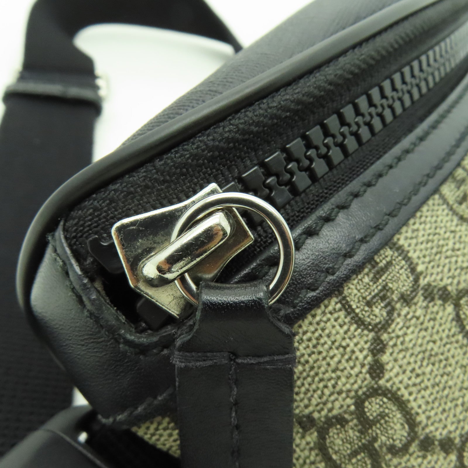 GUCCI 塗層帆布Eden Belt Bag銀扣腰包黒色/棕色