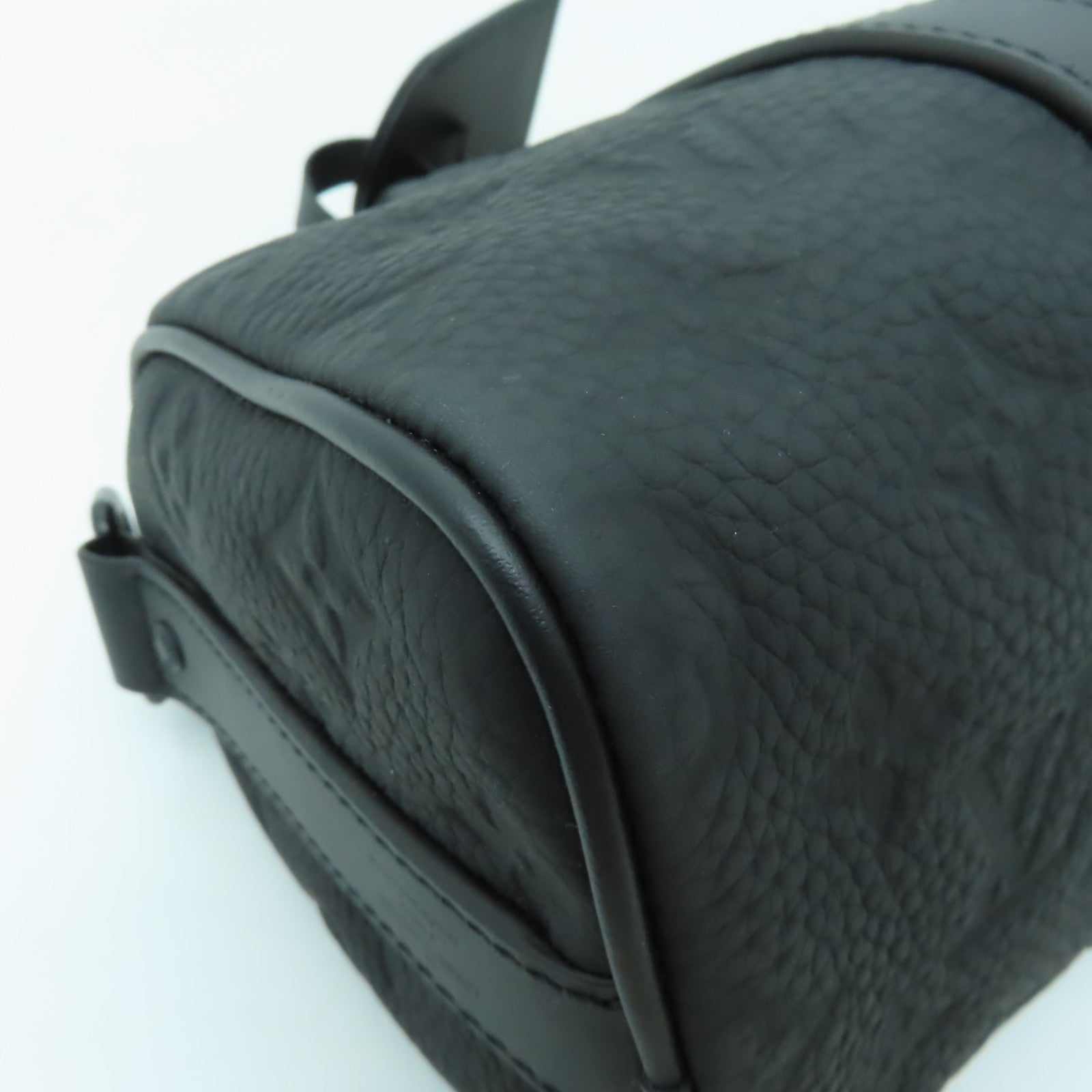LOUIS VUITTON Taurillon皮革 Monogram Keepall Bandouliere 25黑扣手挽肩背兩用袋黑色