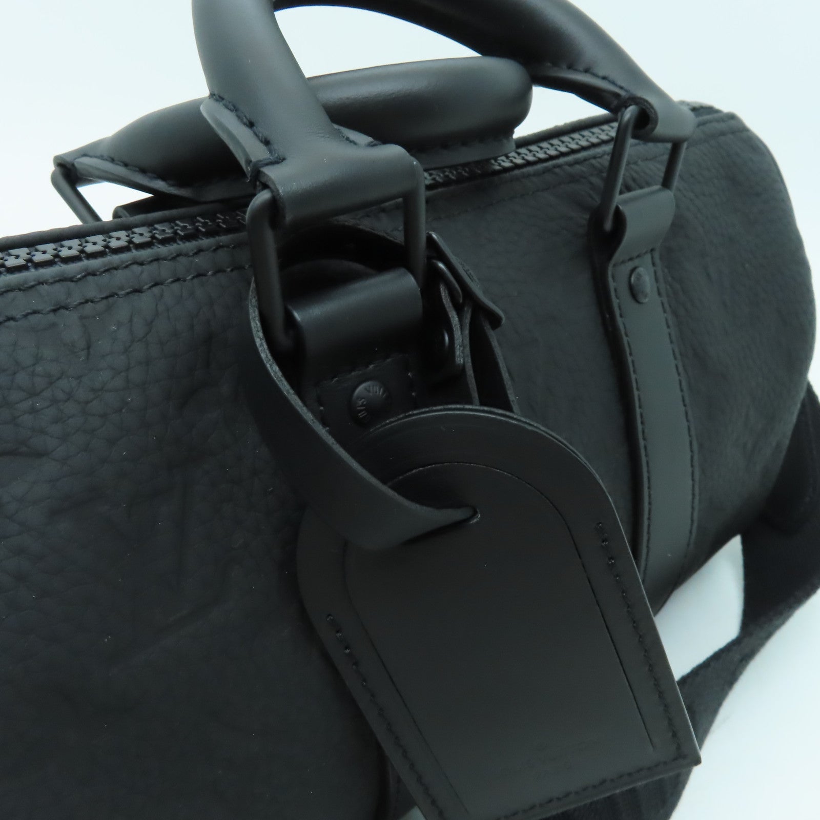 LOUIS VUITTON Taurillon皮革 Monogram Keepall Bandouliere 25黑扣手挽肩背兩用袋黑色