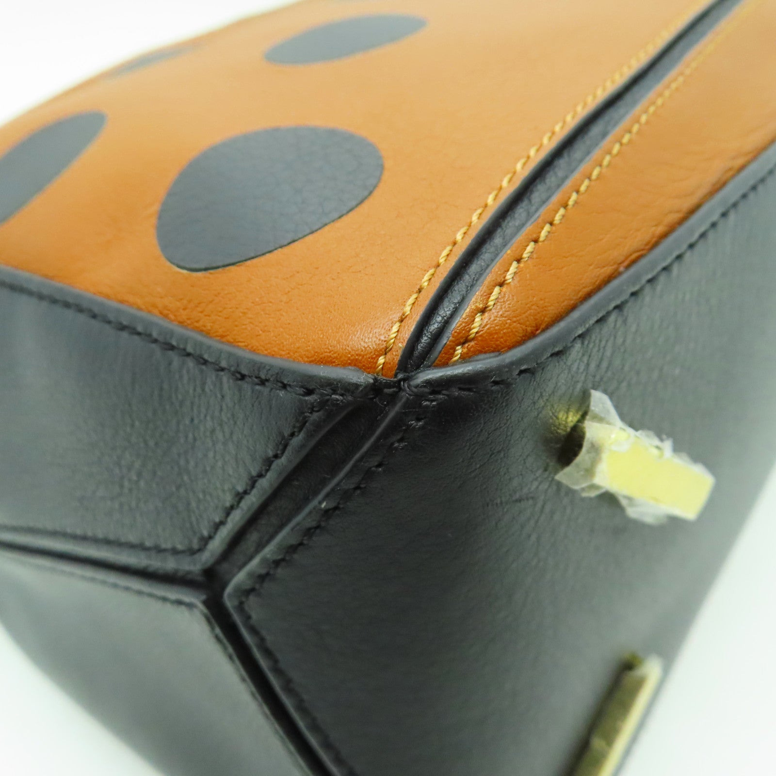 LOEWE 牛皮皮革Puzzle金扣手挽肩背兩用袋黑色/啡色