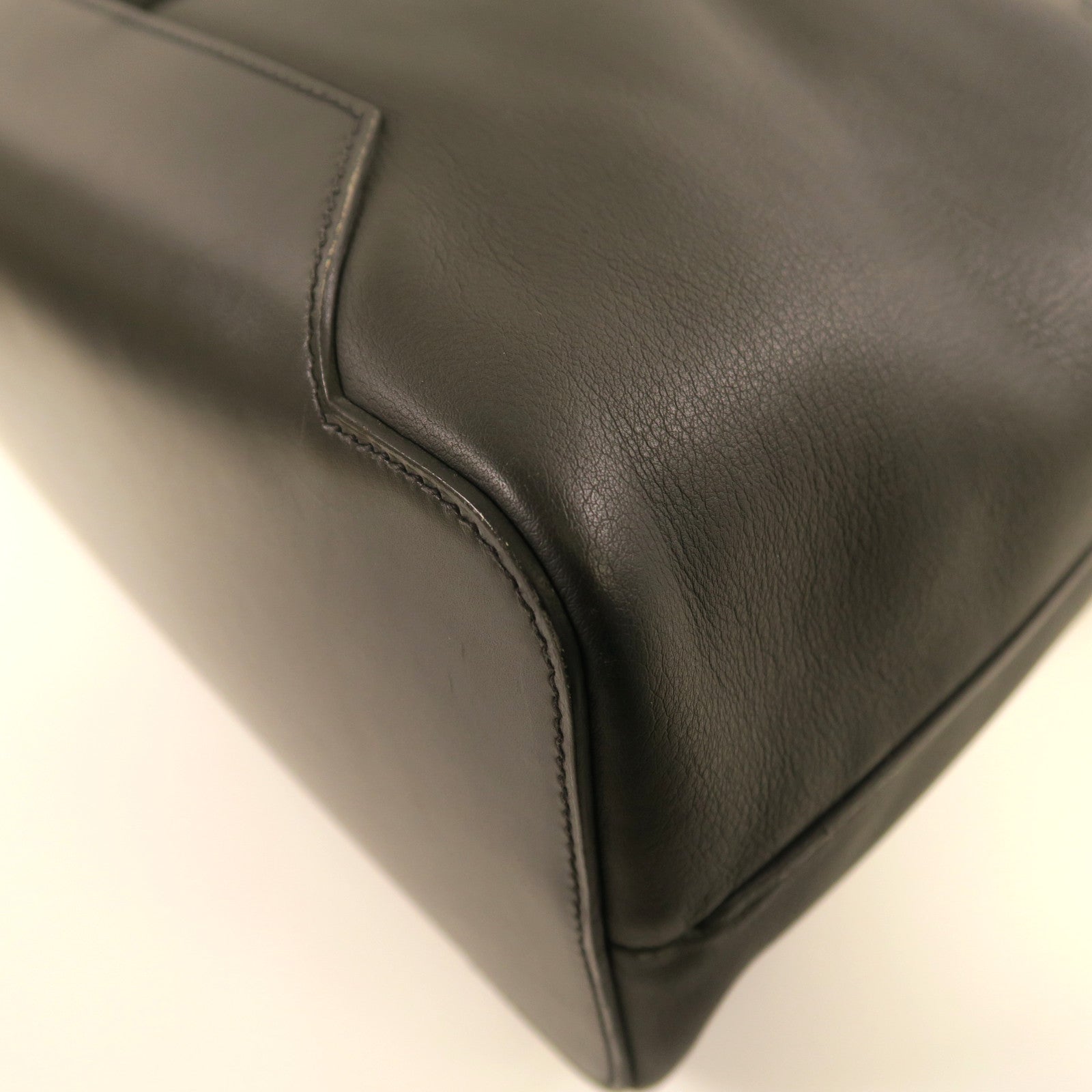 HERMES Taurillon Cristobal皮革Cityslide Messenger銀扣肩背袋黑色/檸檬黃色