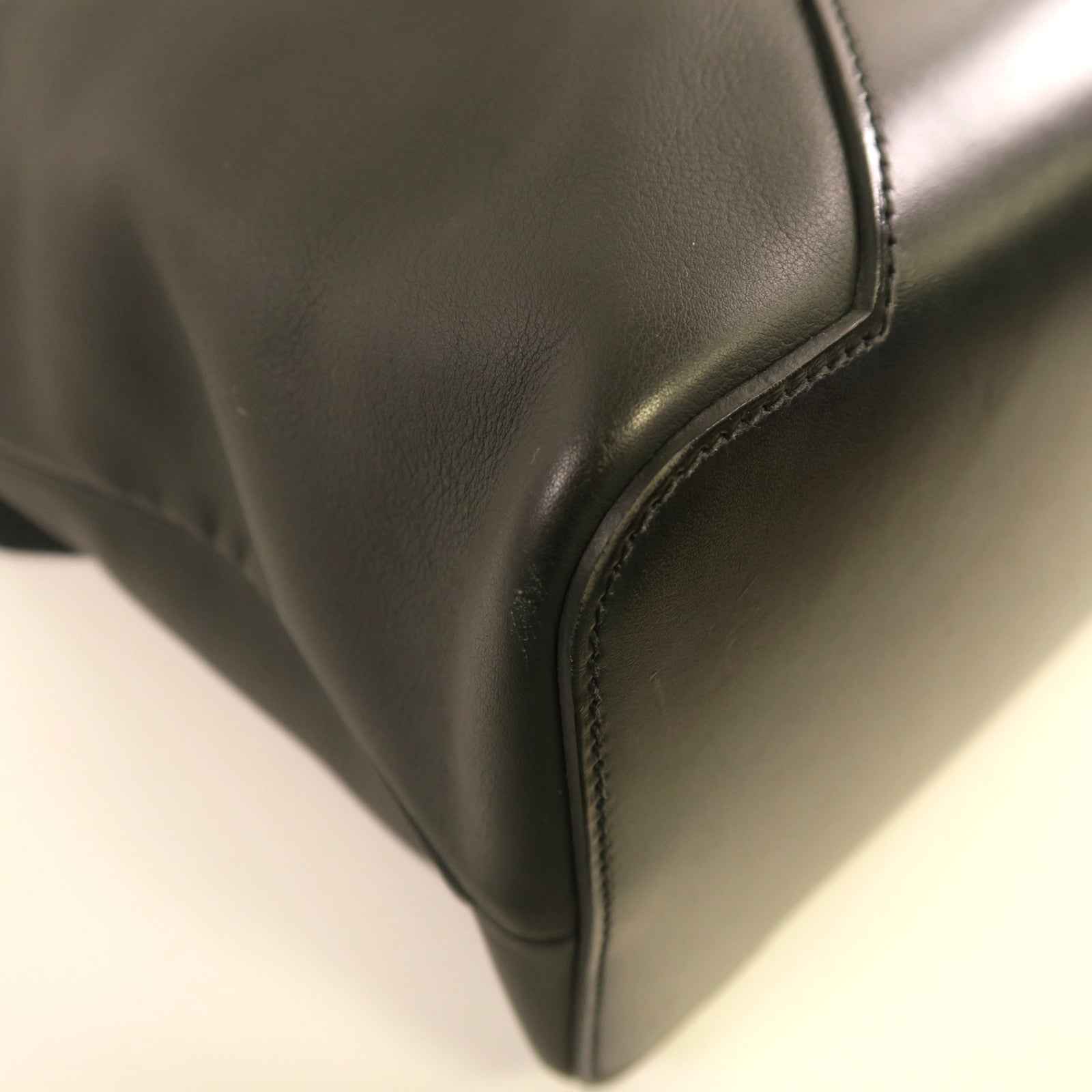 HERMES Taurillon Cristobal皮革Cityslide Messenger銀扣肩背袋黑色/檸檬黃色
