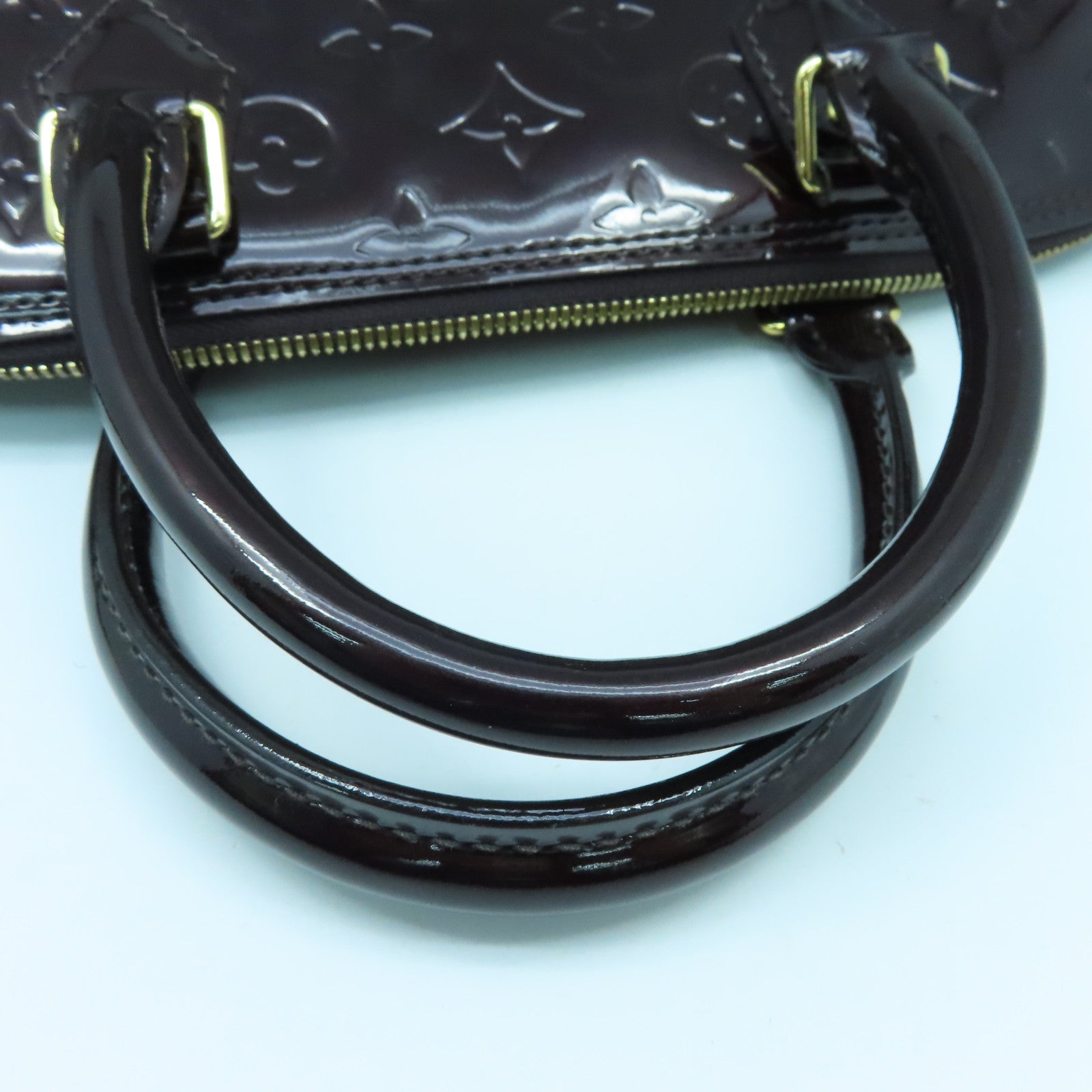 LOUIS VUITTON Monogram Vernis Alma GM金扣手挽袋紫色