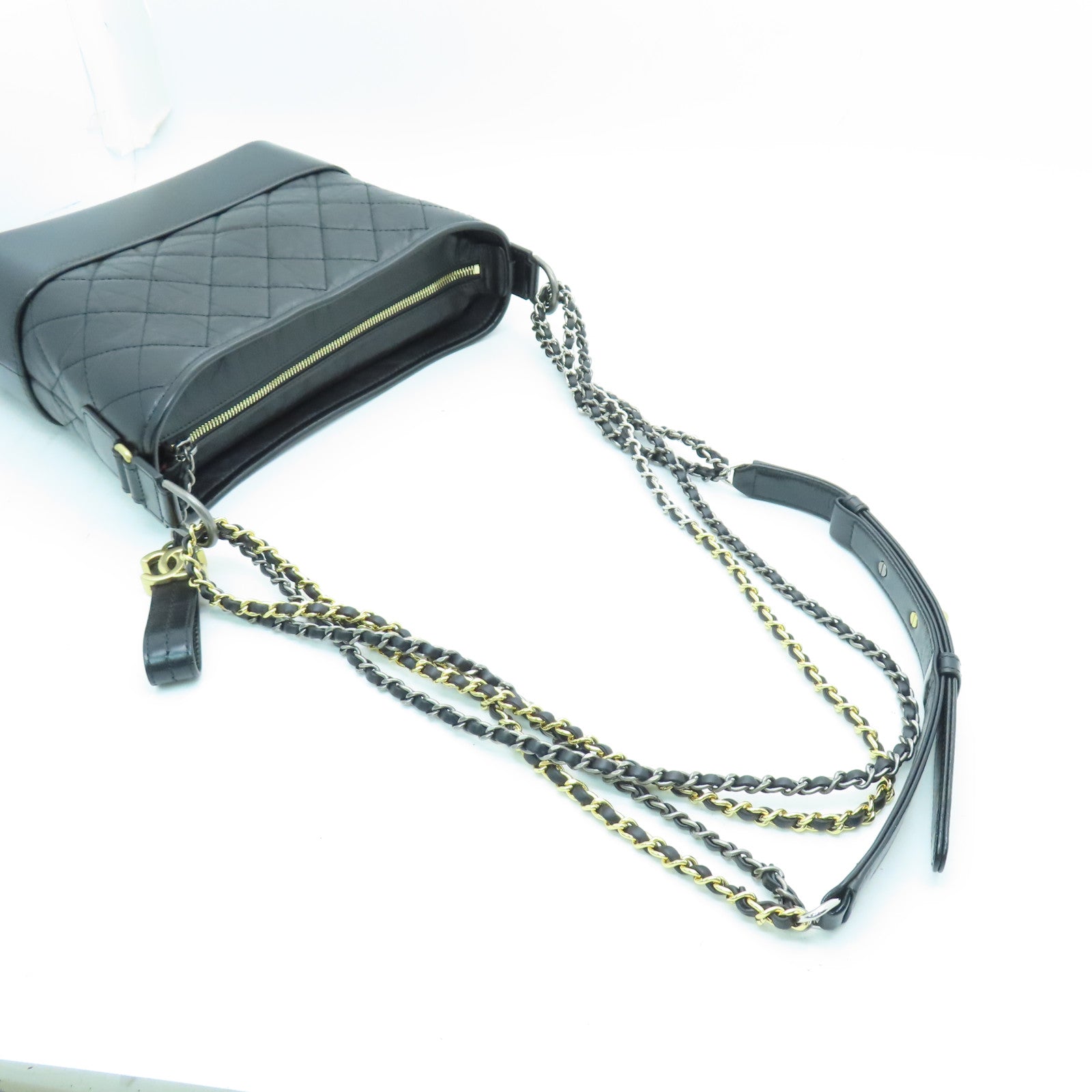 CHANEL rhombic cowhide leather Gabrelle Medium gold and silver buckle shoulder bag black