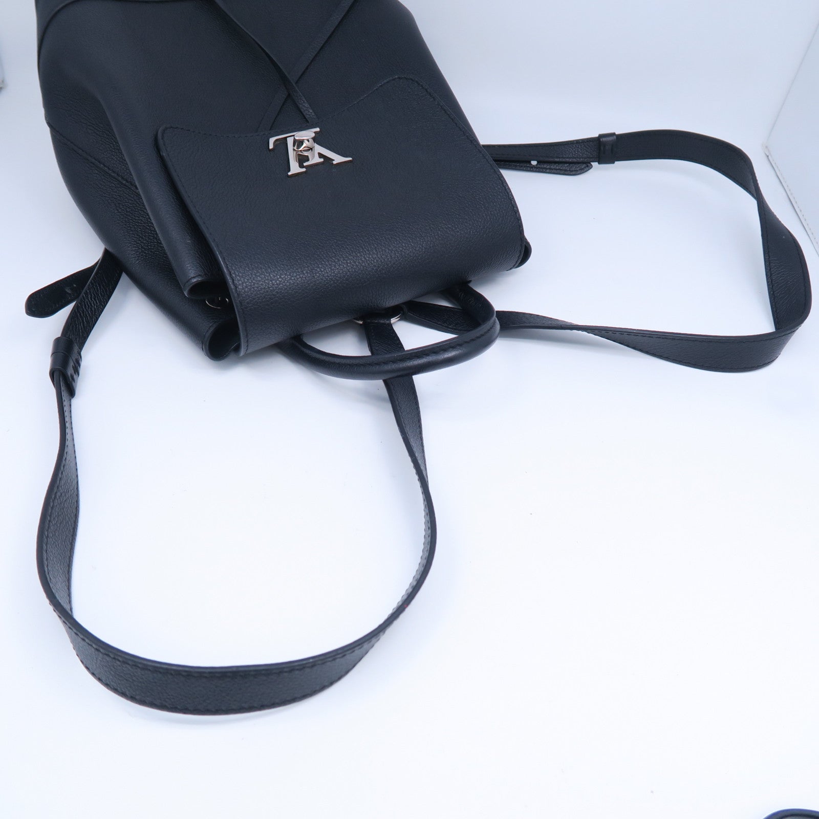 LOUIS VUITTON 牛皮皮革Lockme Backpack銀扣背包黑色