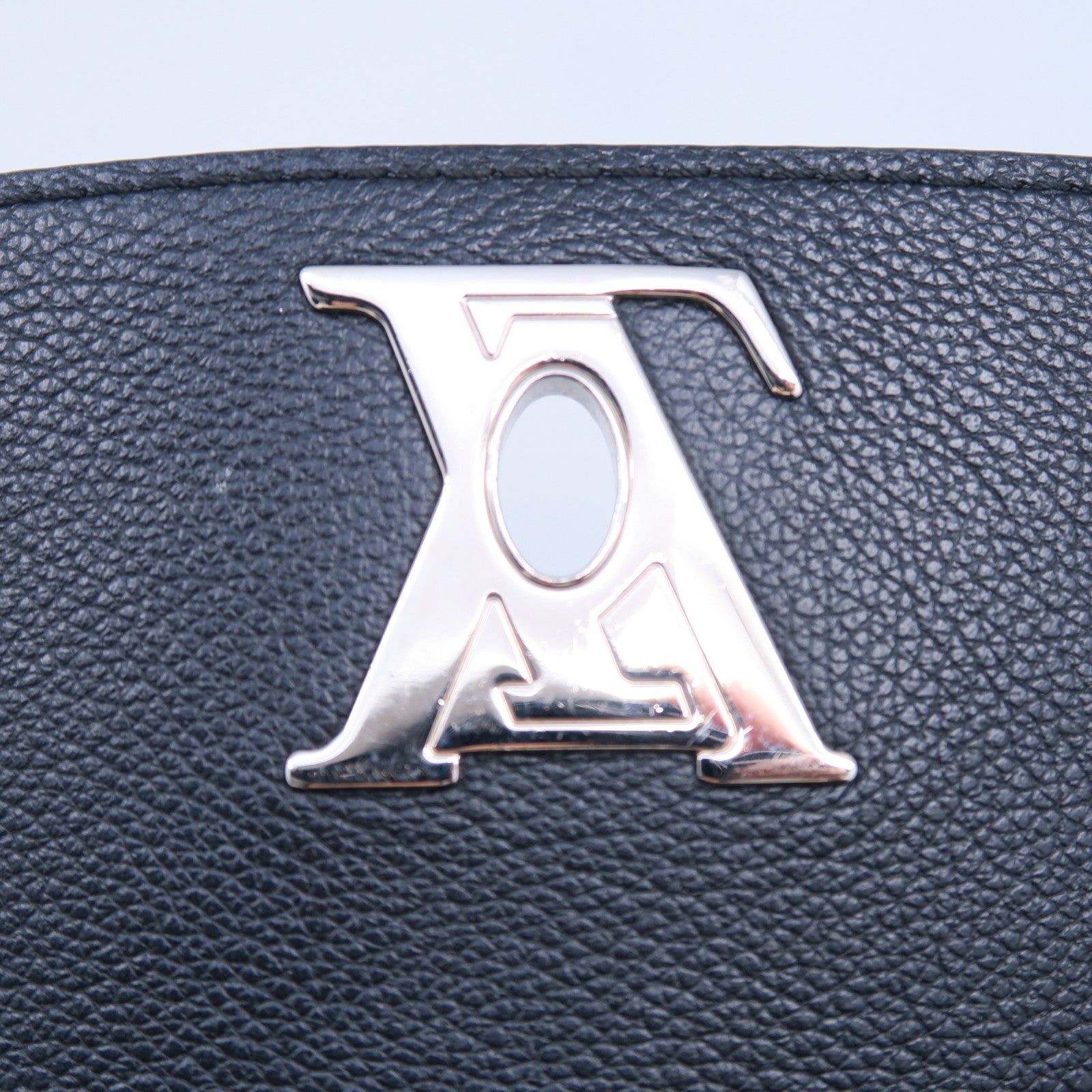 LOUIS VUITTON 牛皮皮革Lockme Backpack銀扣背包黑色