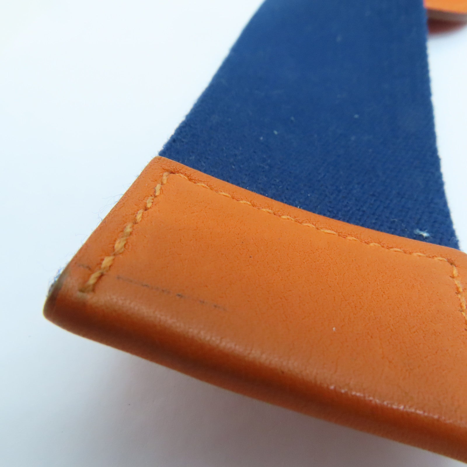 HERMES Evercolor Leather Charm Silver Buckle Charm Orange/Navy Blue
