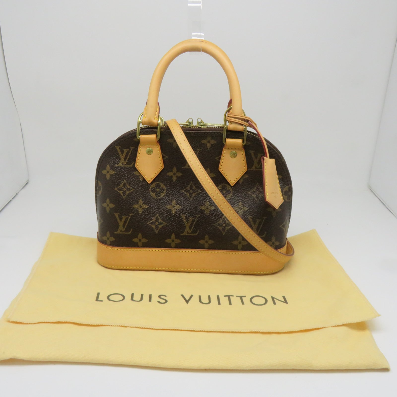 LOUIS VUITTON Monogram Alma BB Gold Buckle Shoulder Bag Brown