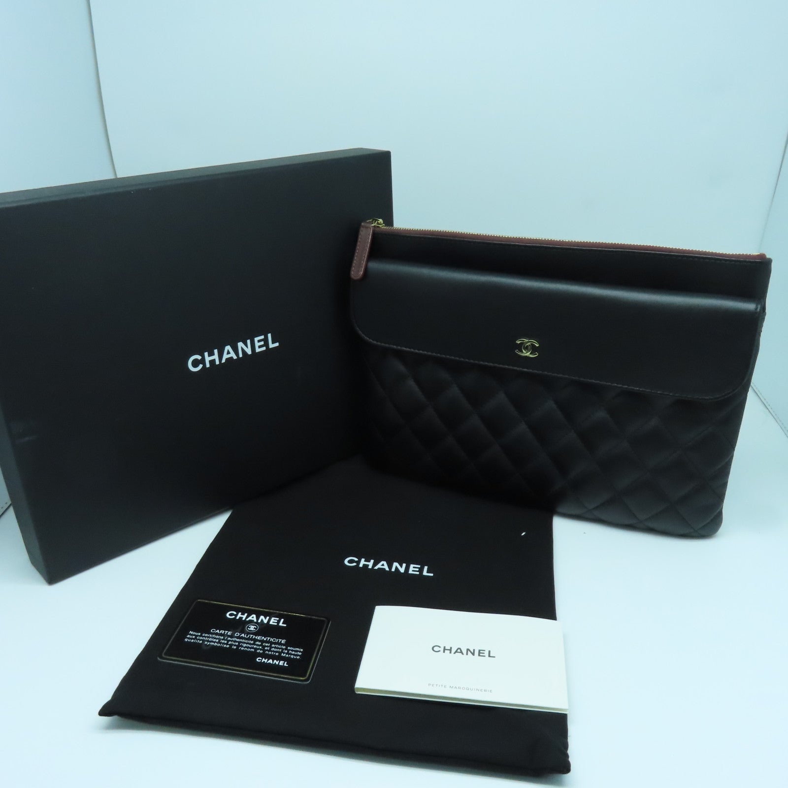 CHANEL 菱格羊皮皮革Clutch金扣手拿包黑色