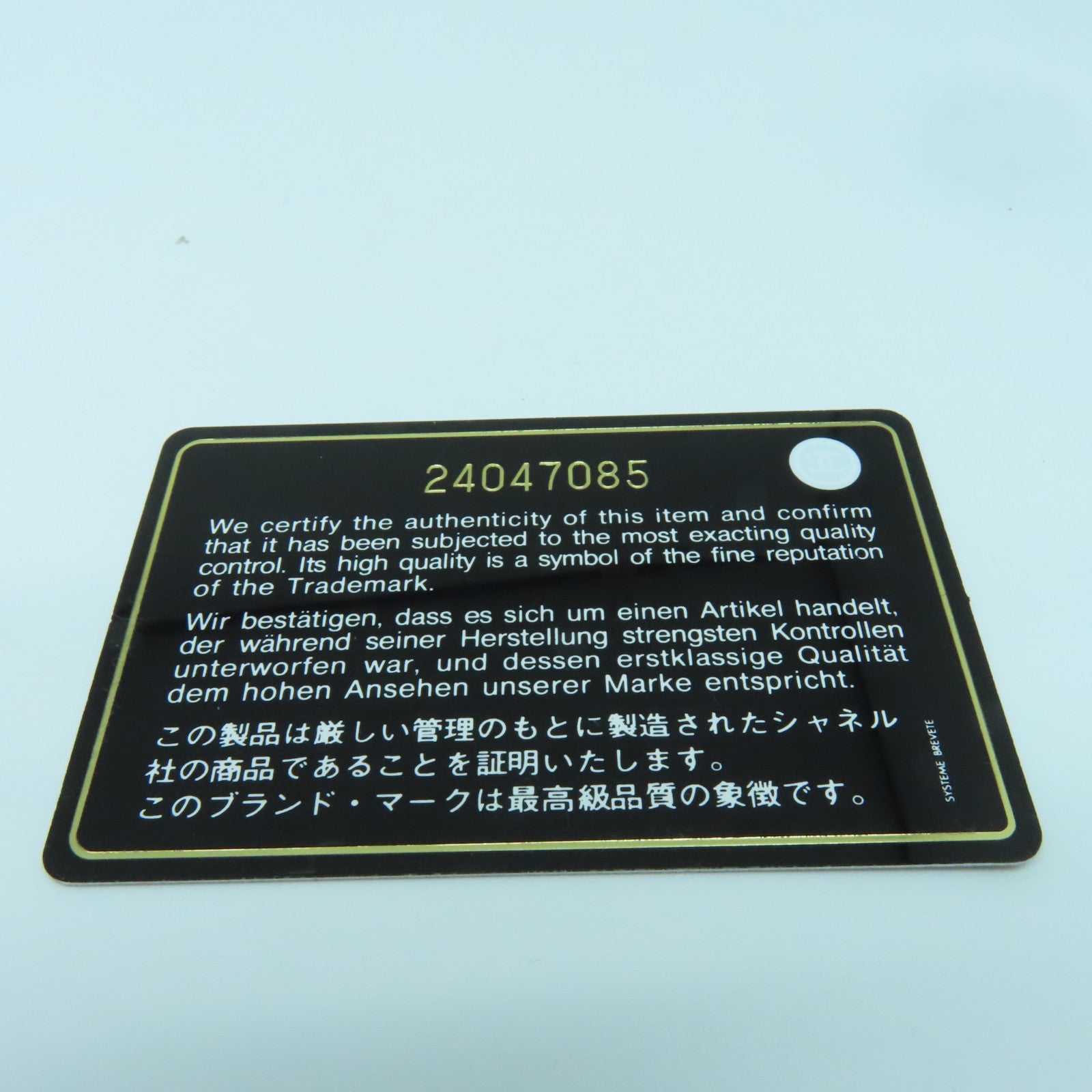 CHANEL 菱格羊皮皮革Clutch金扣手拿包黑色