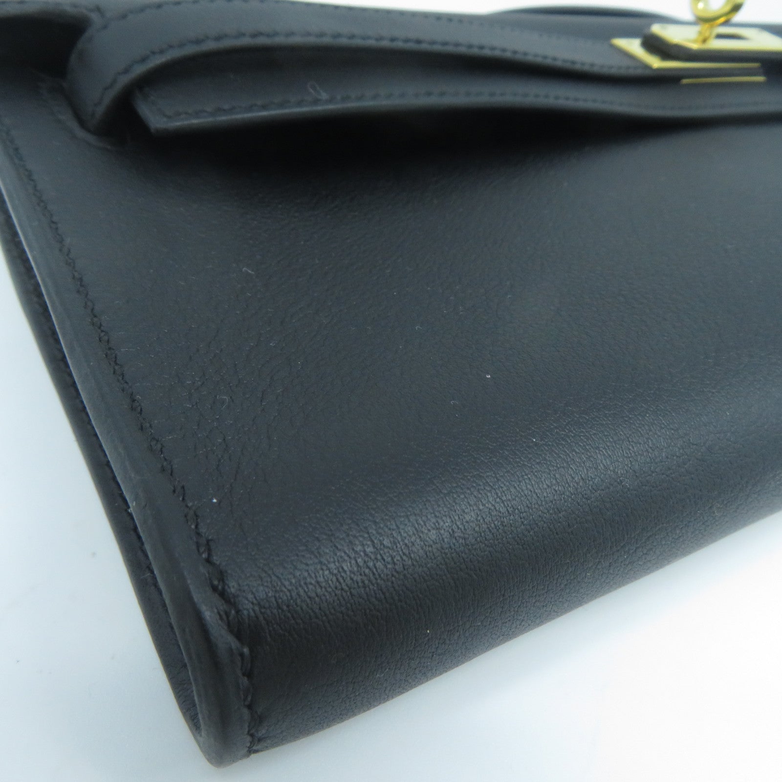 HERMES Swift皮革Kelly Cut金扣手挽袋黑色