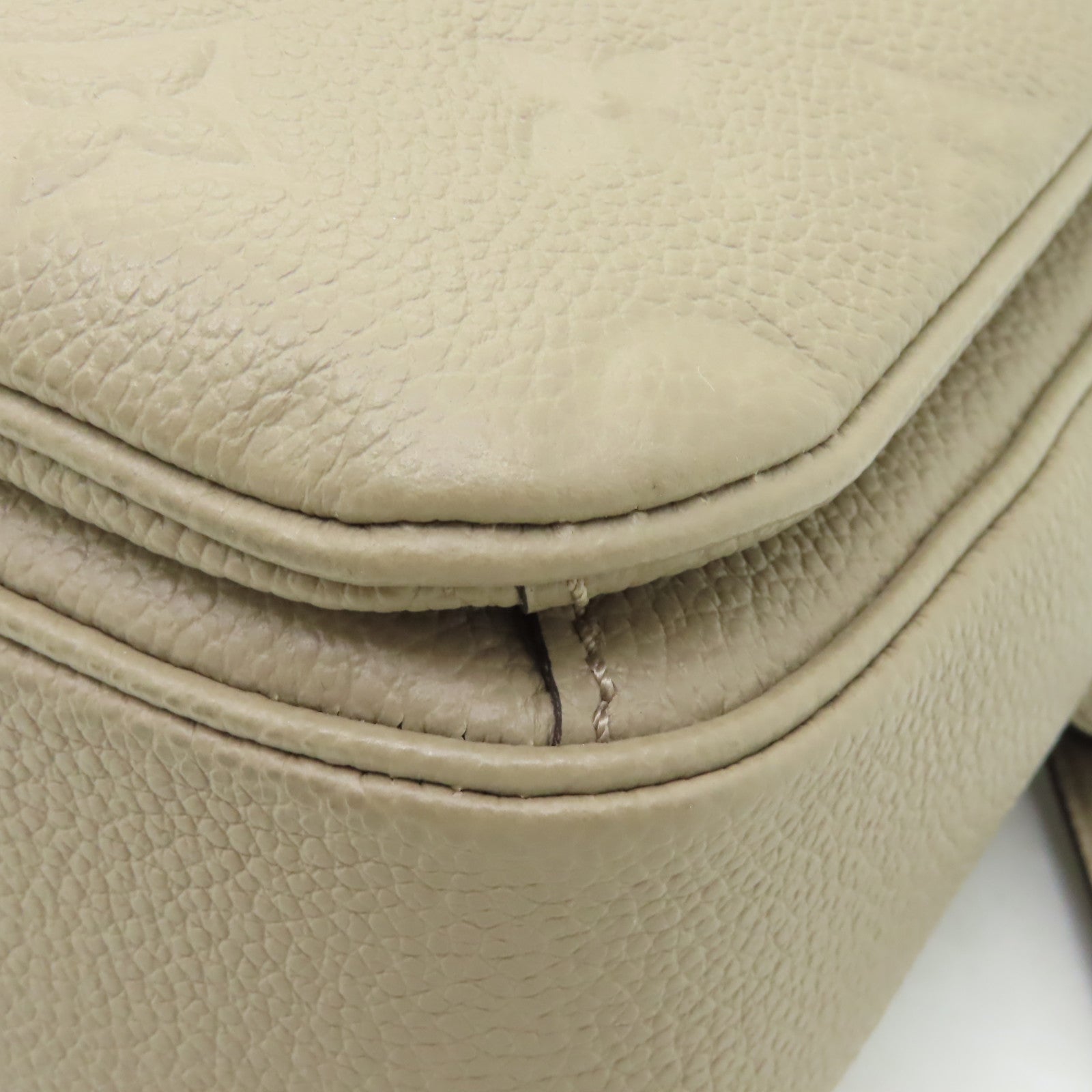 LOUIS VUITTON Monogram Empreinte Pochette Metis金扣手挽肩背兩用袋米色