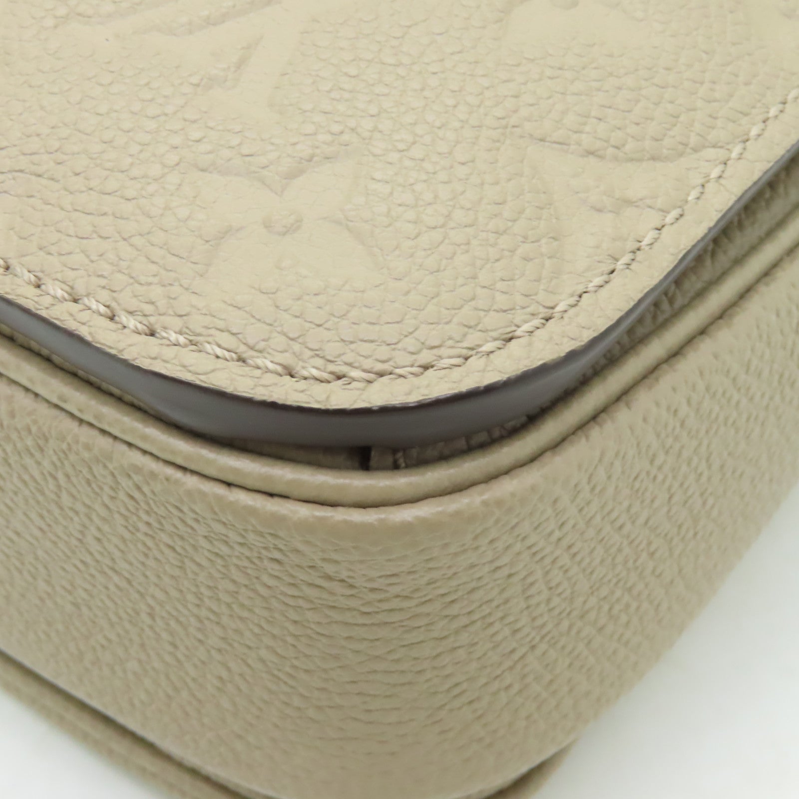 LOUIS VUITTON Monogram Empreinte Pochette Metis金扣手挽肩背兩用袋米色