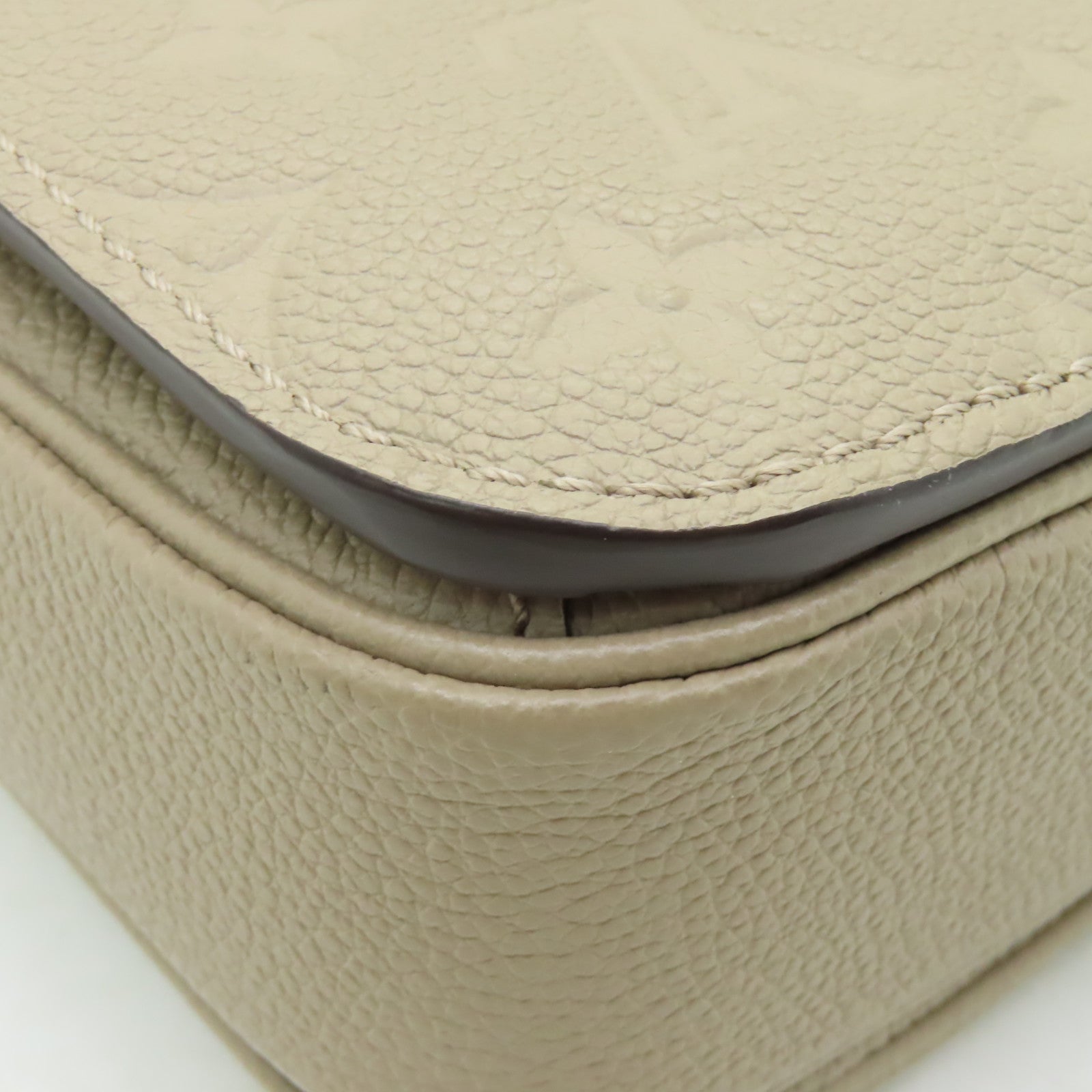 LOUIS VUITTON Monogram Empreinte Pochette Metis金扣手挽肩背兩用袋米色