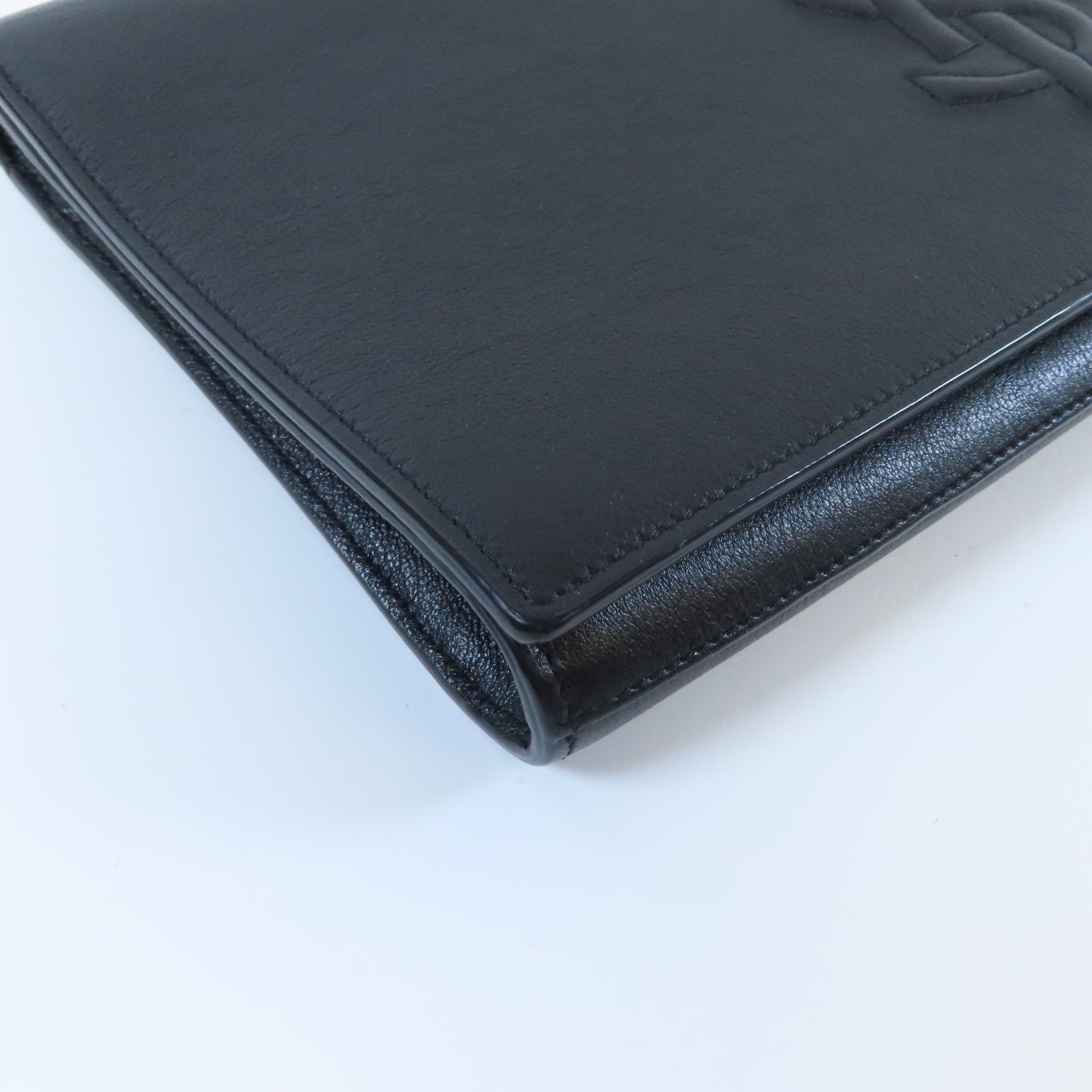 YVES SAINT LAURENT 牛皮皮革Clutch金扣手拿包黑色
