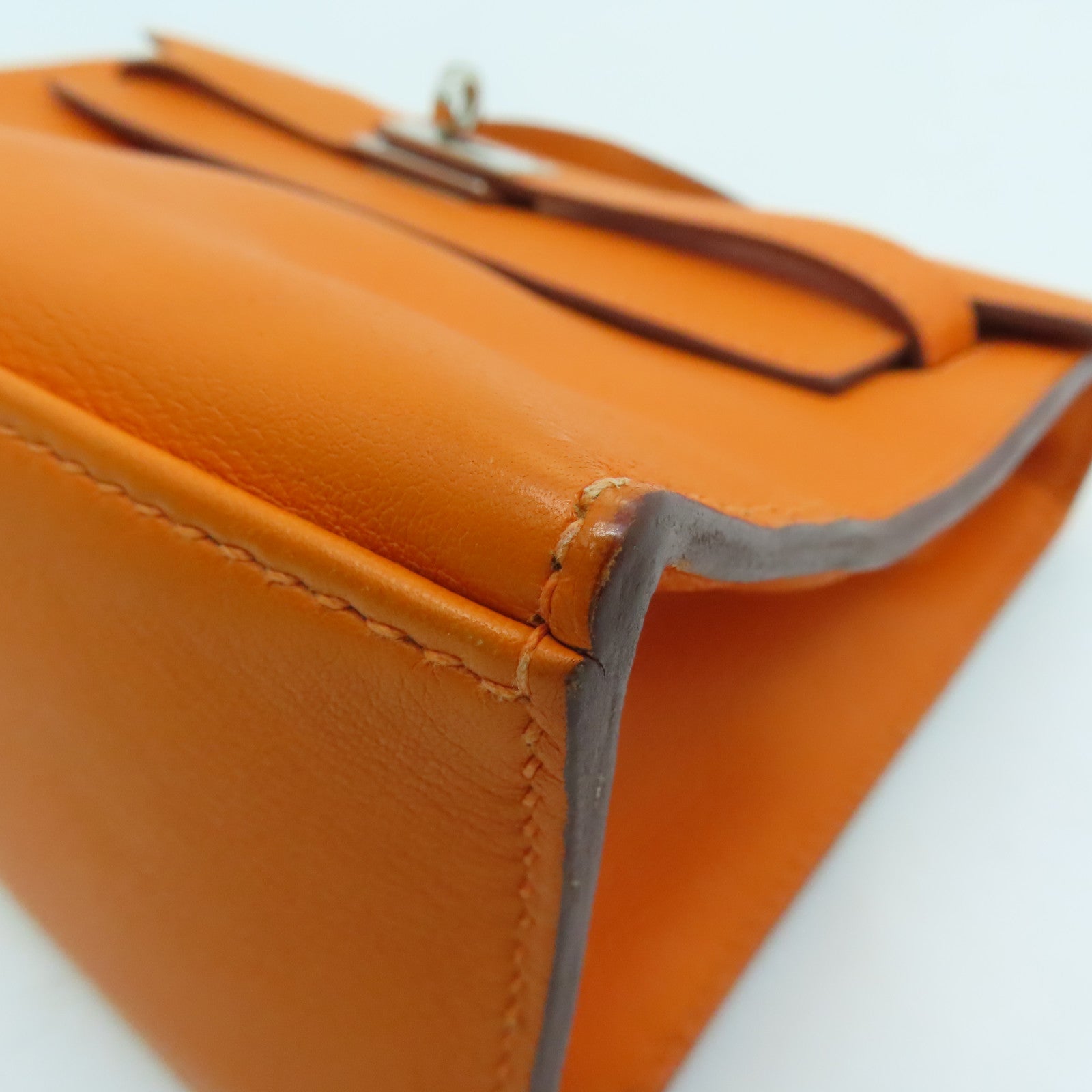 HERMES 【激減優惠】Swift皮革Kelly Pochette金扣手挽袋橙色