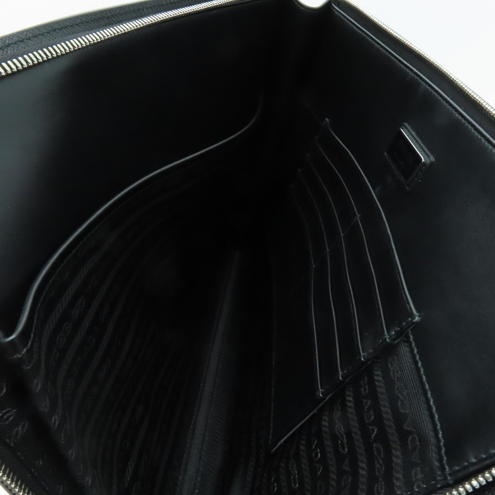 PRADA 牛皮皮革Clutch Bag銀扣手拿包黑色